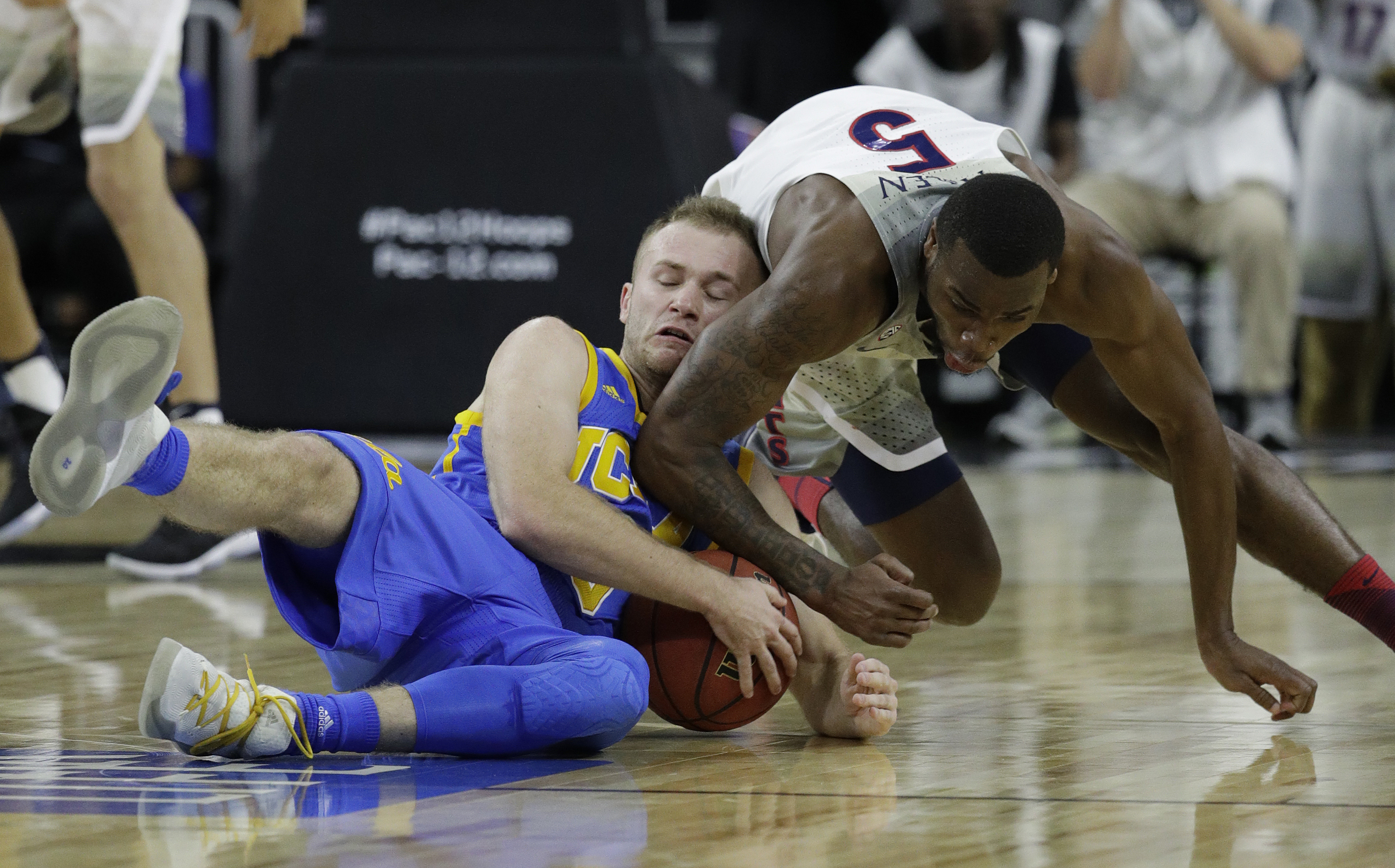 No. 7 Arizona beats No. 3 UCLA 86-75 in Pac-12 semifinals