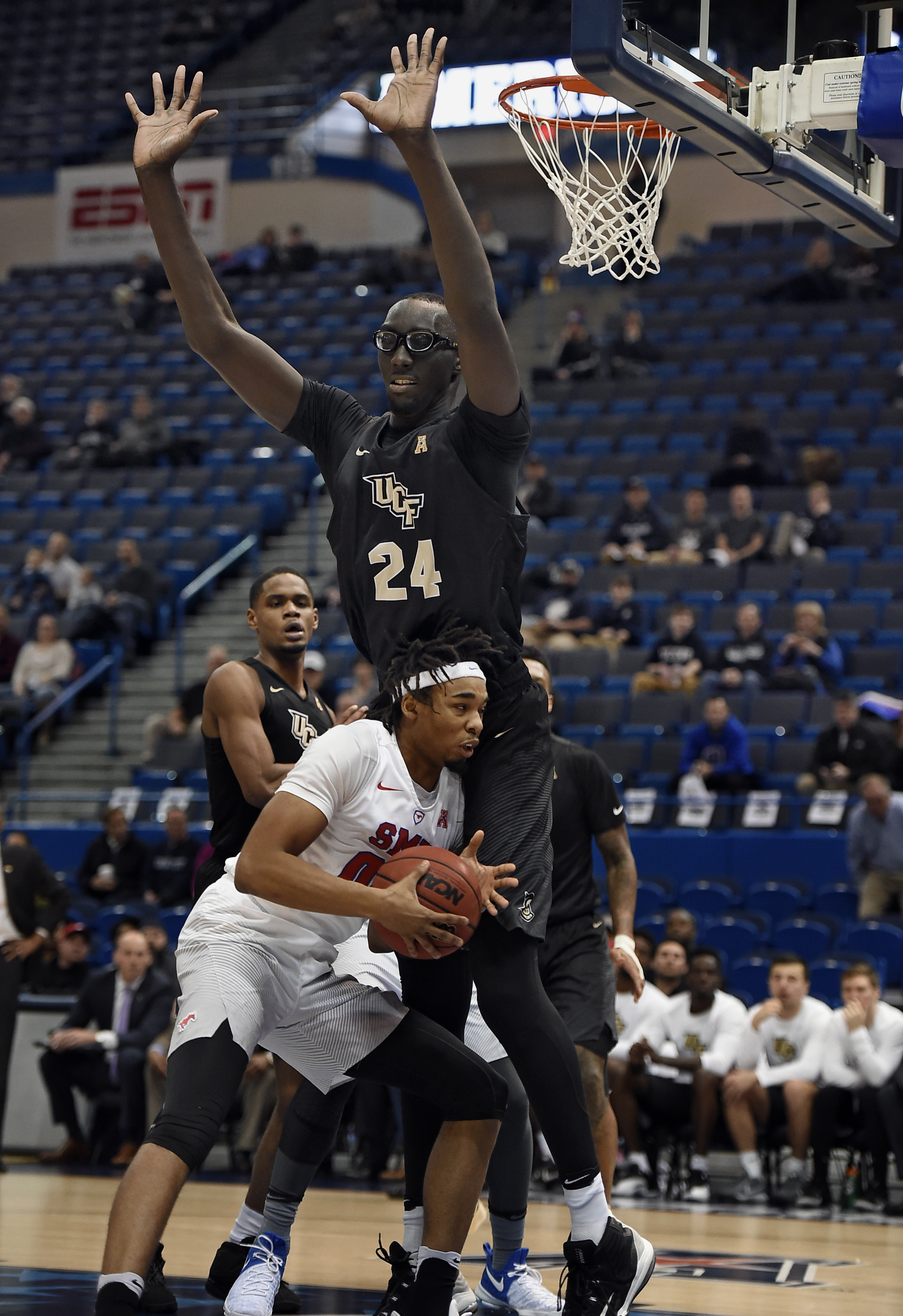 No. 12 SMU beats UCF 70-59 in American semifinals