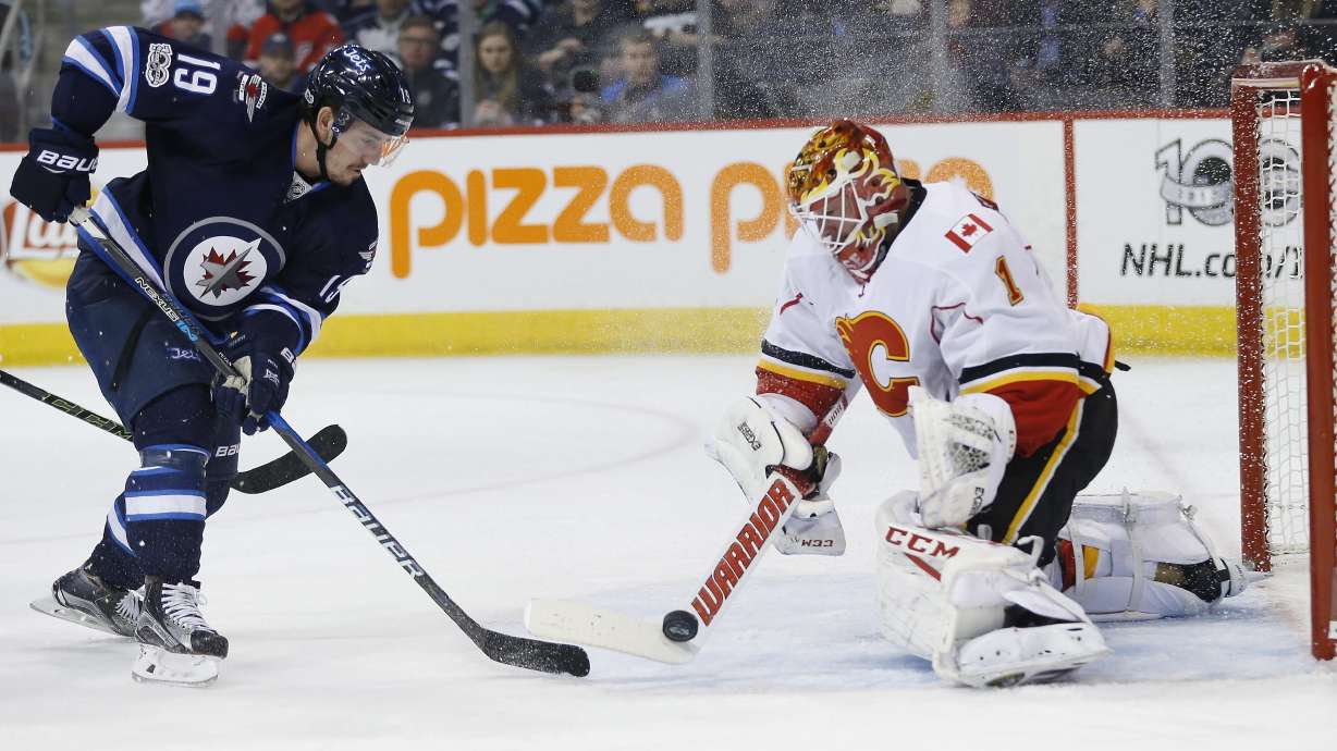 Flames blank Jets to extend win streak to 9 games