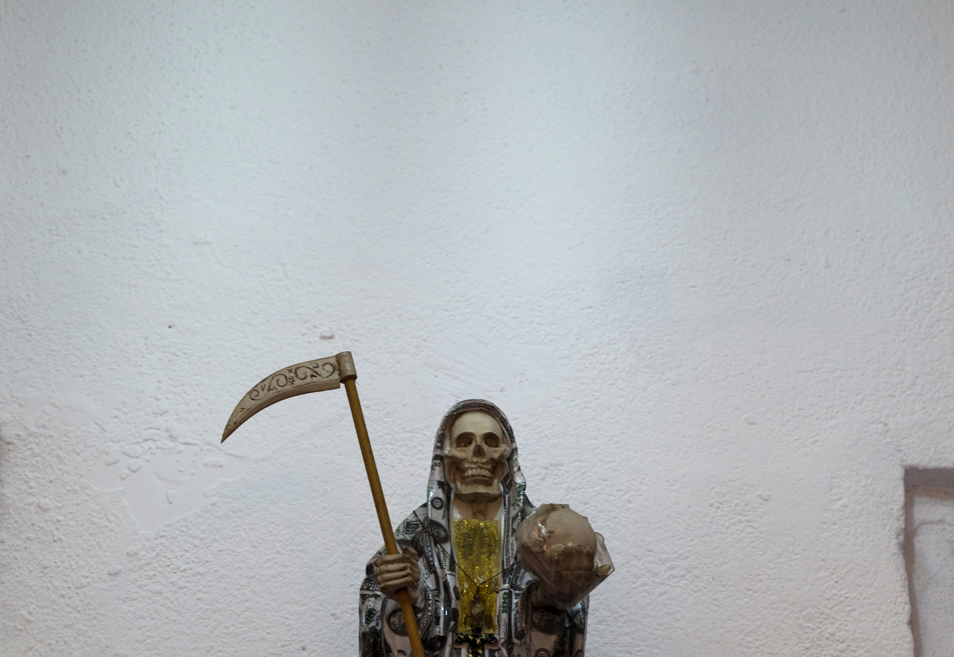 AP PHOTOS: Death Saint draws followers in Mexico