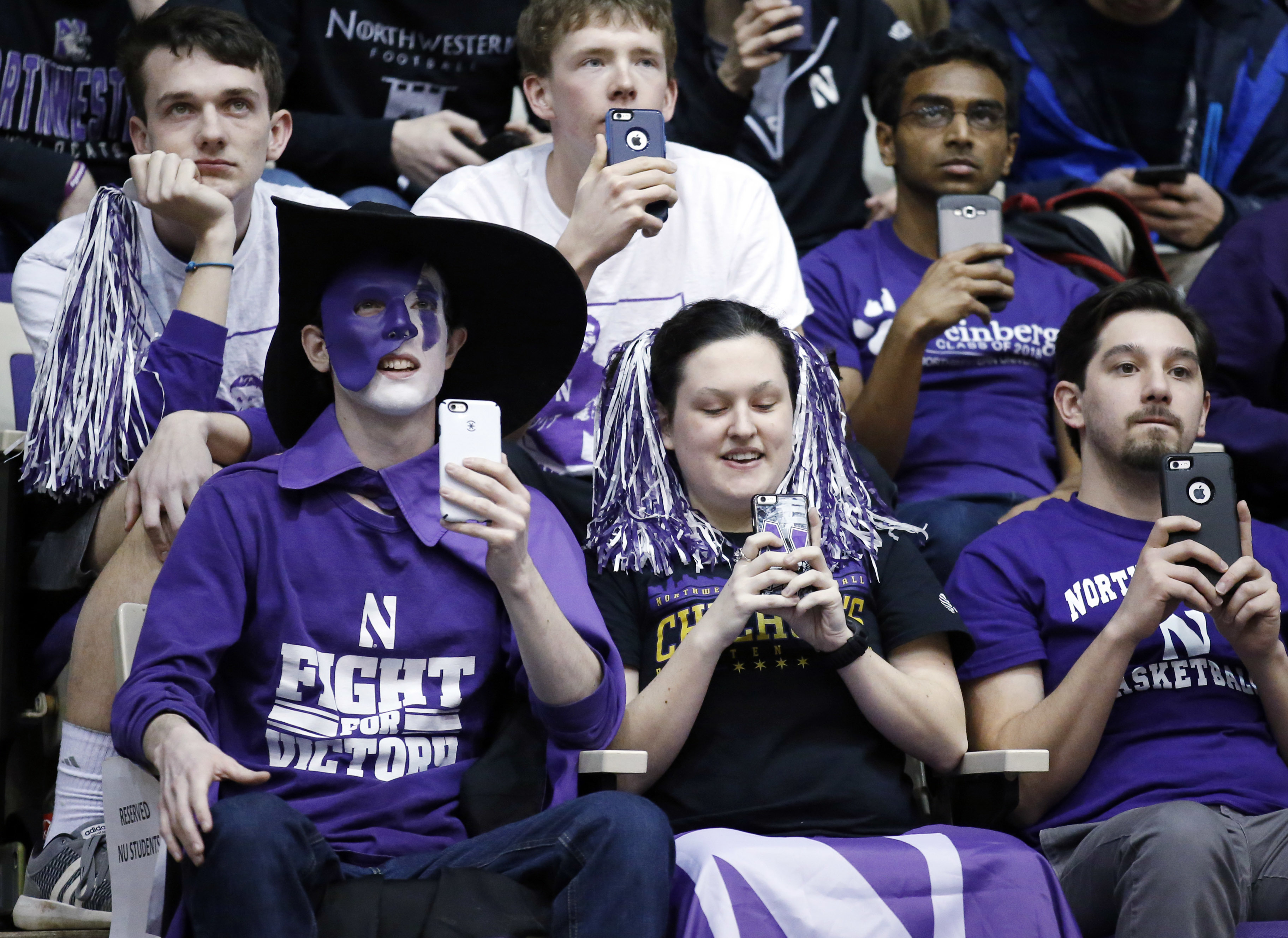 Northwestern fans attend the team's NCAA men's basketball tournament selection show watch party Sunday, March 12, 2017, in Evanston, Ill. (AP Photo/Nam Y. Huh)