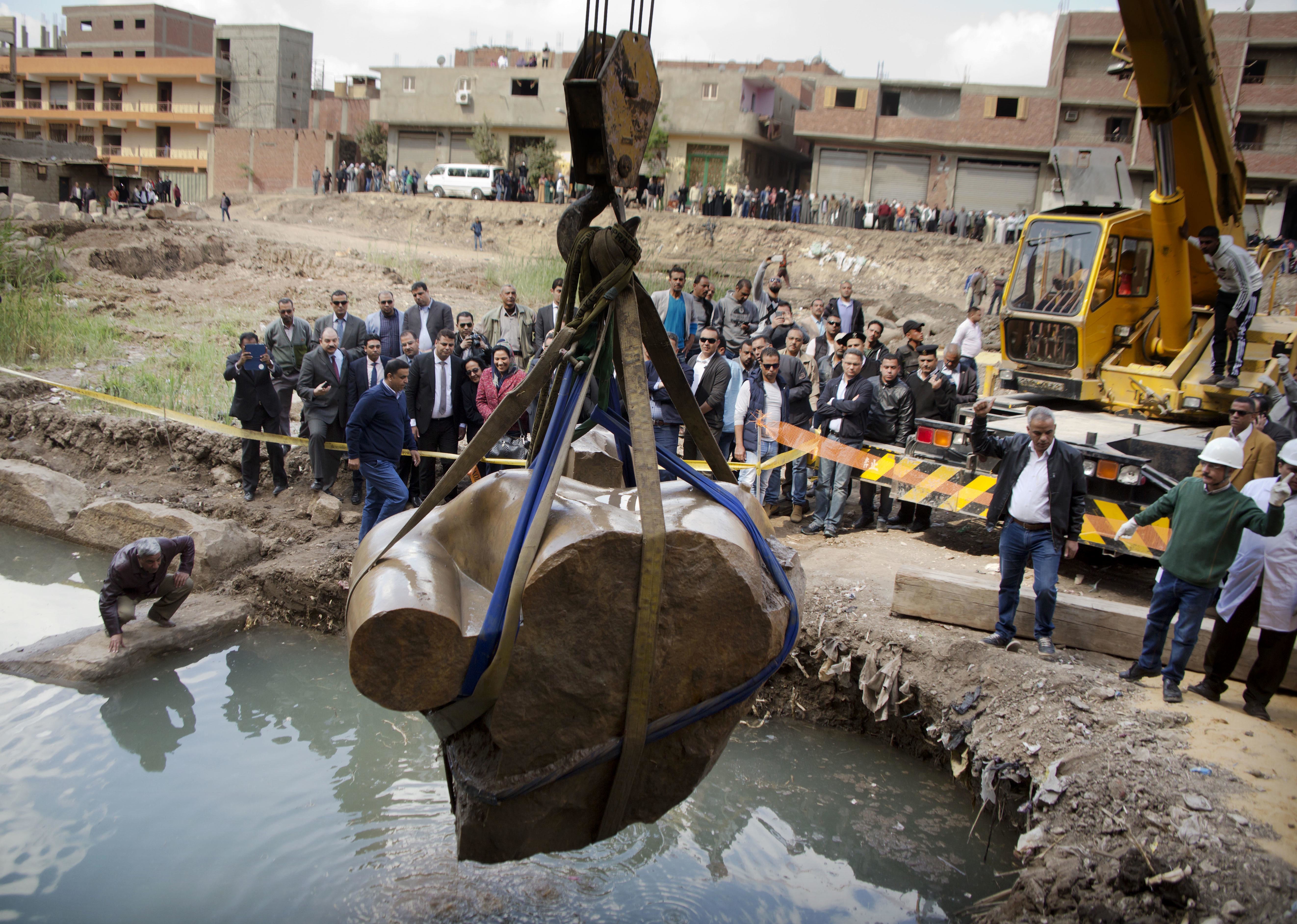 Second part of ancient Egyptian statue lifted from site
