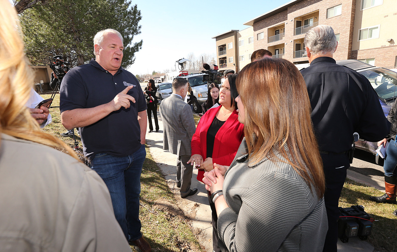 Property owner Scott Drews talks with South Salt Lake council member Portia Mila and Mayor Cherie Wood after city officials held a news conference outlining the many reasons the proposed homeless resource center sites in their city do not meet the mandatory selection criteria on Monday, March 13, 2017. (Photo: Scott G Winterton, Deseret News)