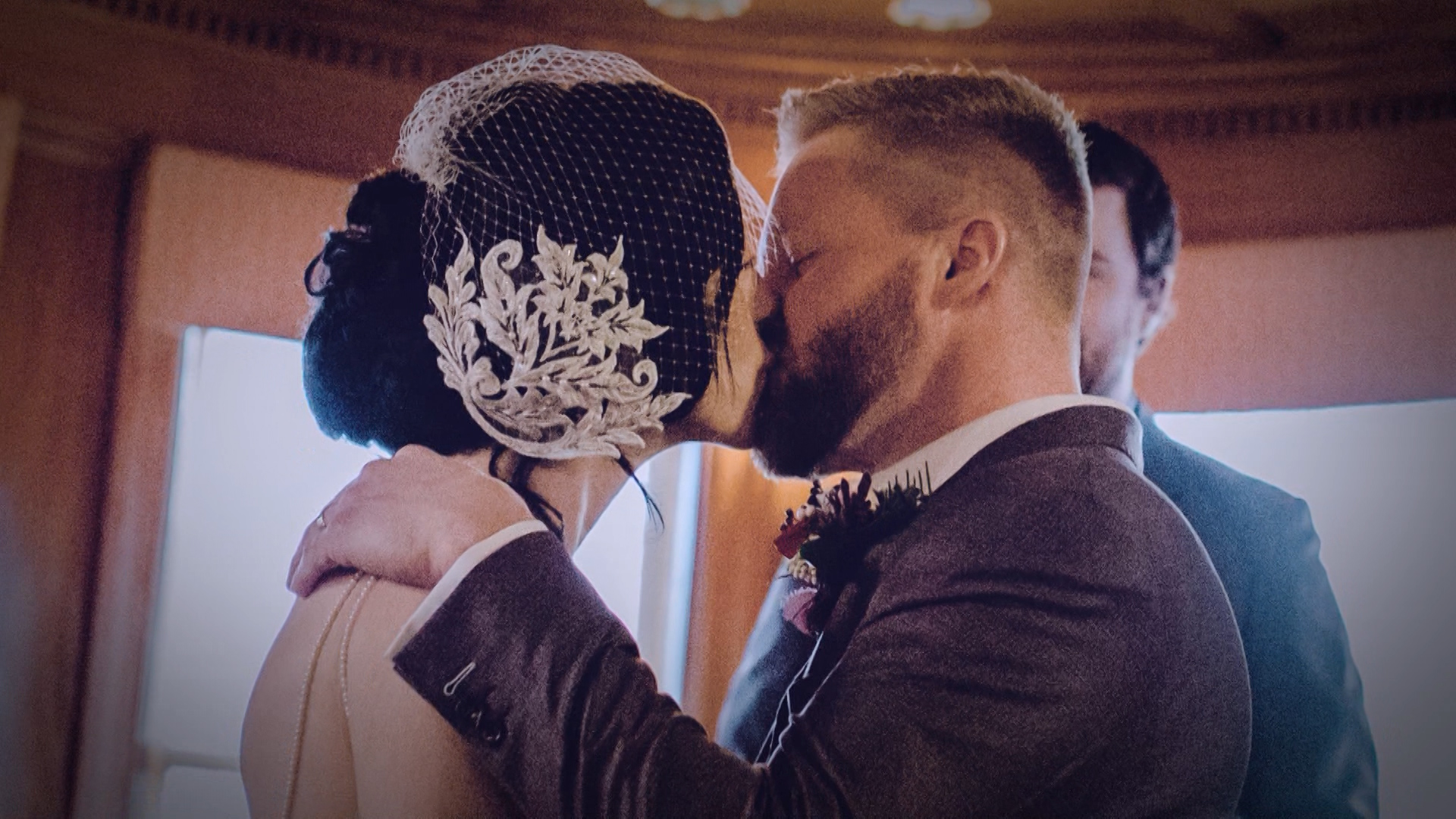 Dustin Shillcox stood from his wheelchair, held onto a walker, then paused to get his balance as he stood and kissed his bride, Sydney Shillcox. (Photo: Family Photo)