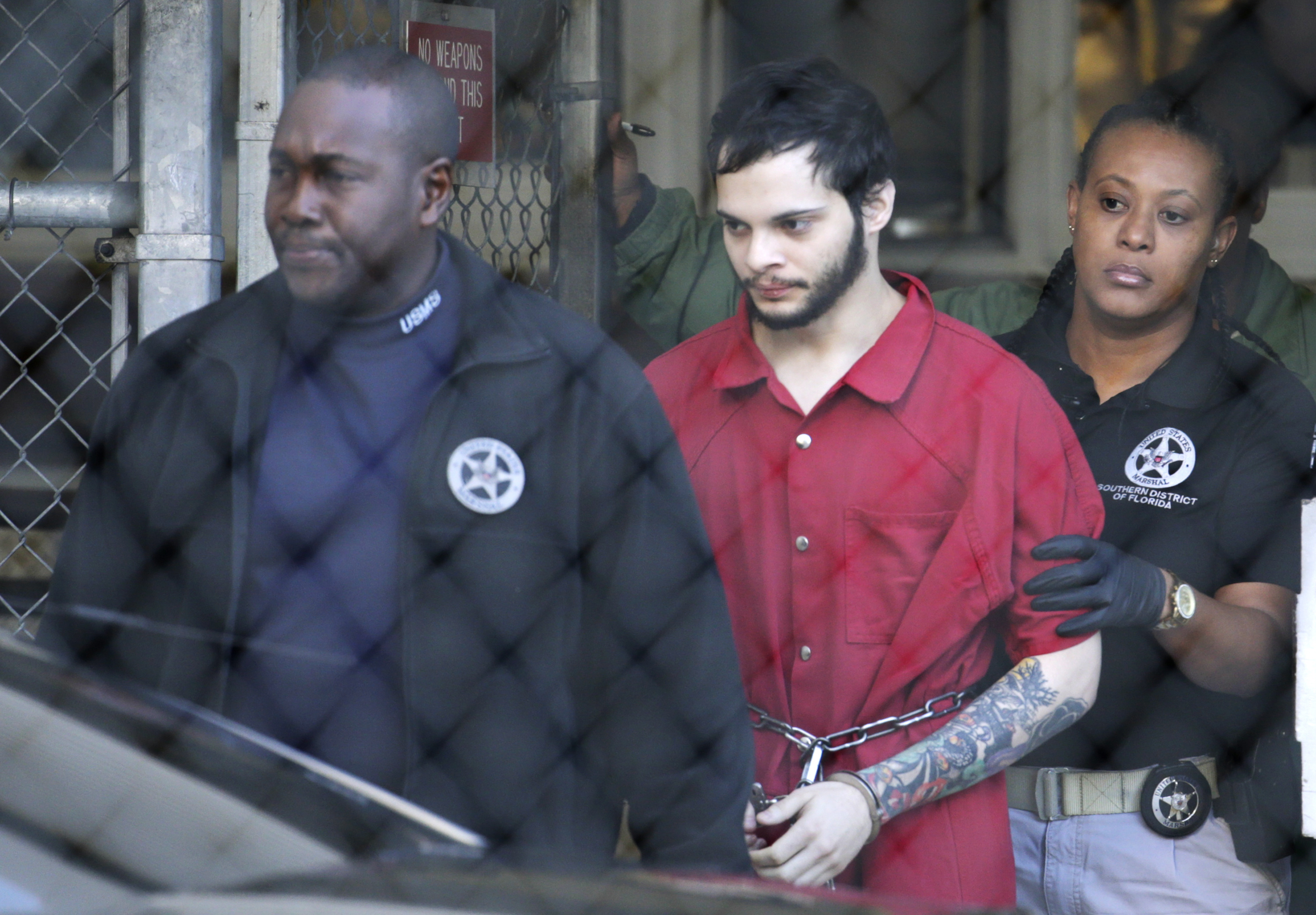 Prosecutors: death decision months away in airport shooting