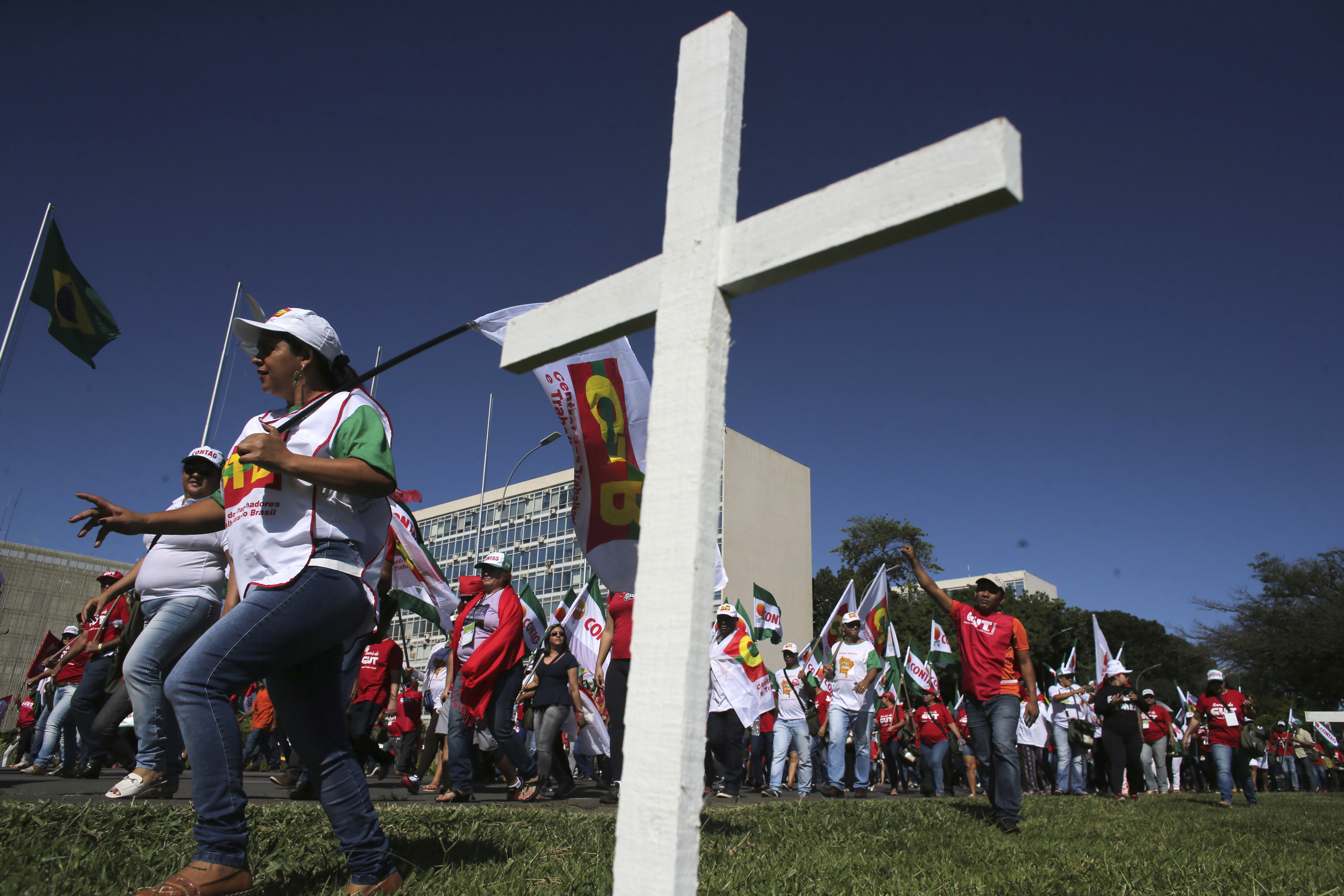 Brazilians demonstrate, strike to protest pension changes