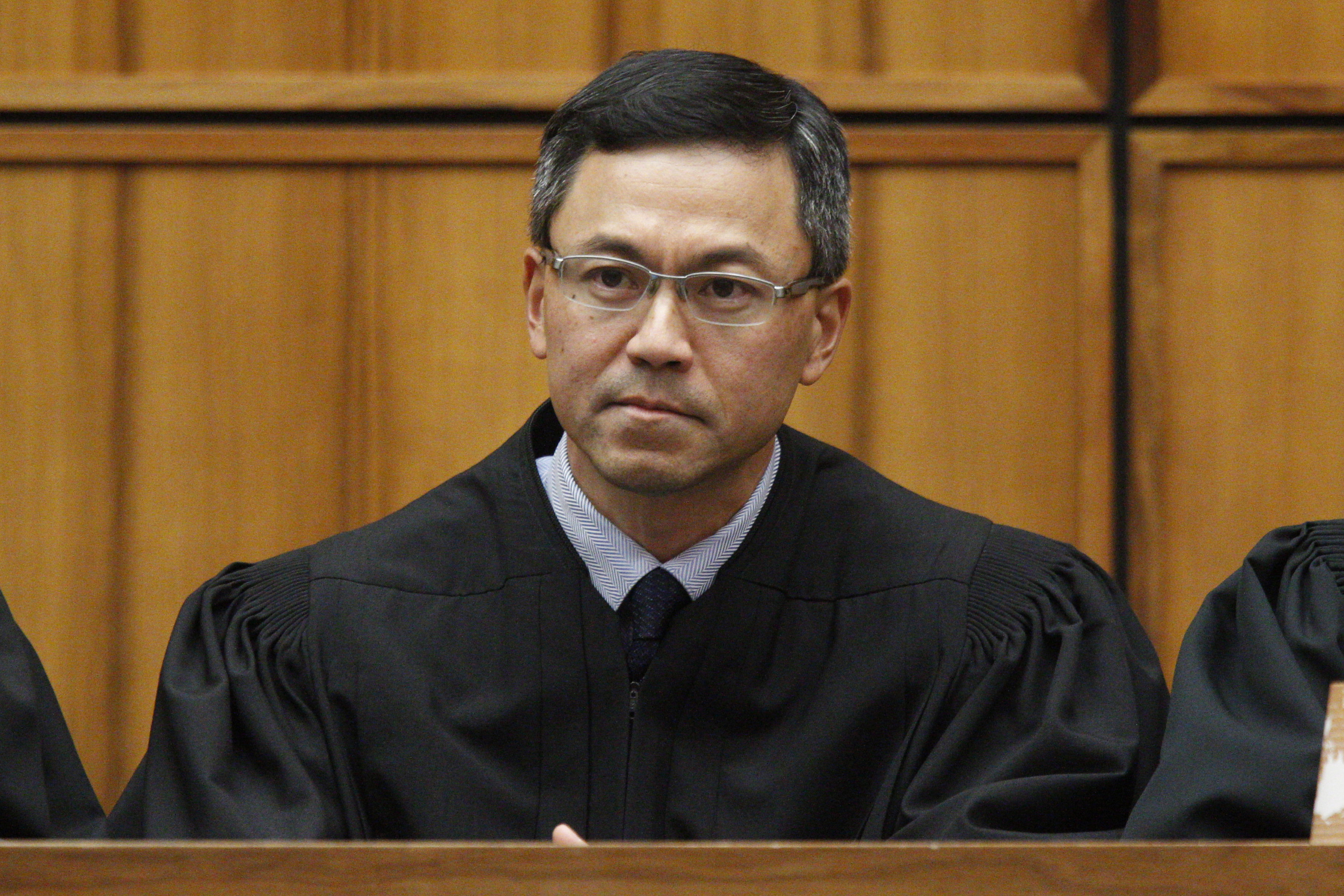 Native Hawaiian federal judge halts revised travel ban