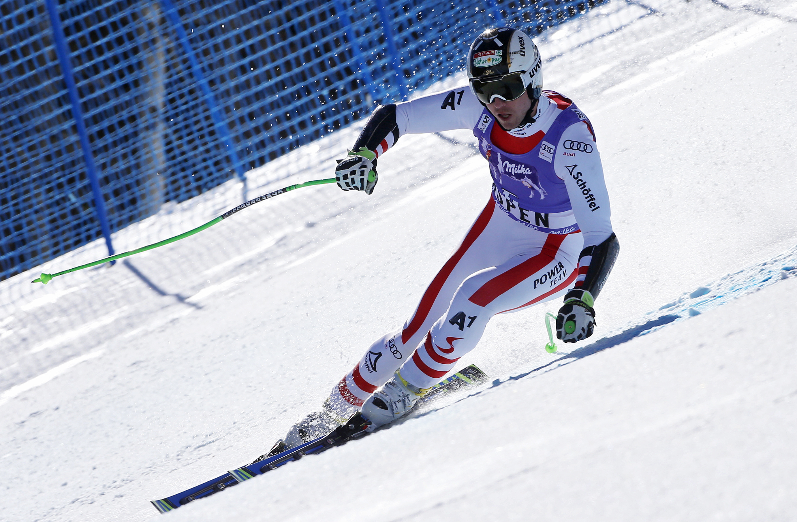 At 36, Austrian Hannes Reichelt captures super-G at finals