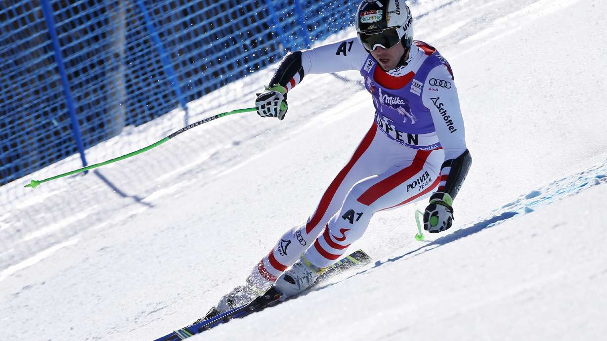 At 36, Austrian Hannes Reichelt captures super-G at finals