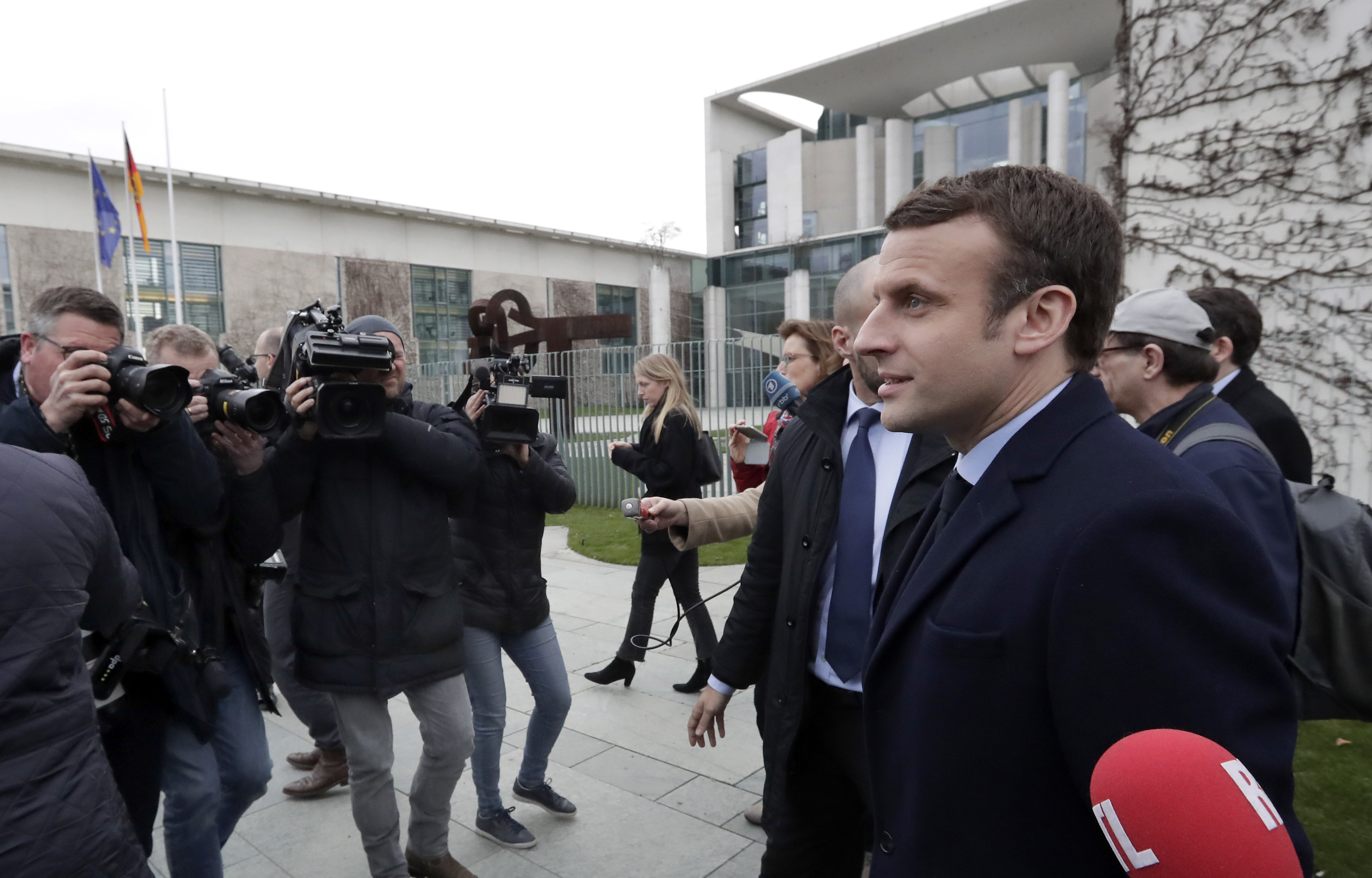 France's Macron backs European unity in Berlin, meets Merkel