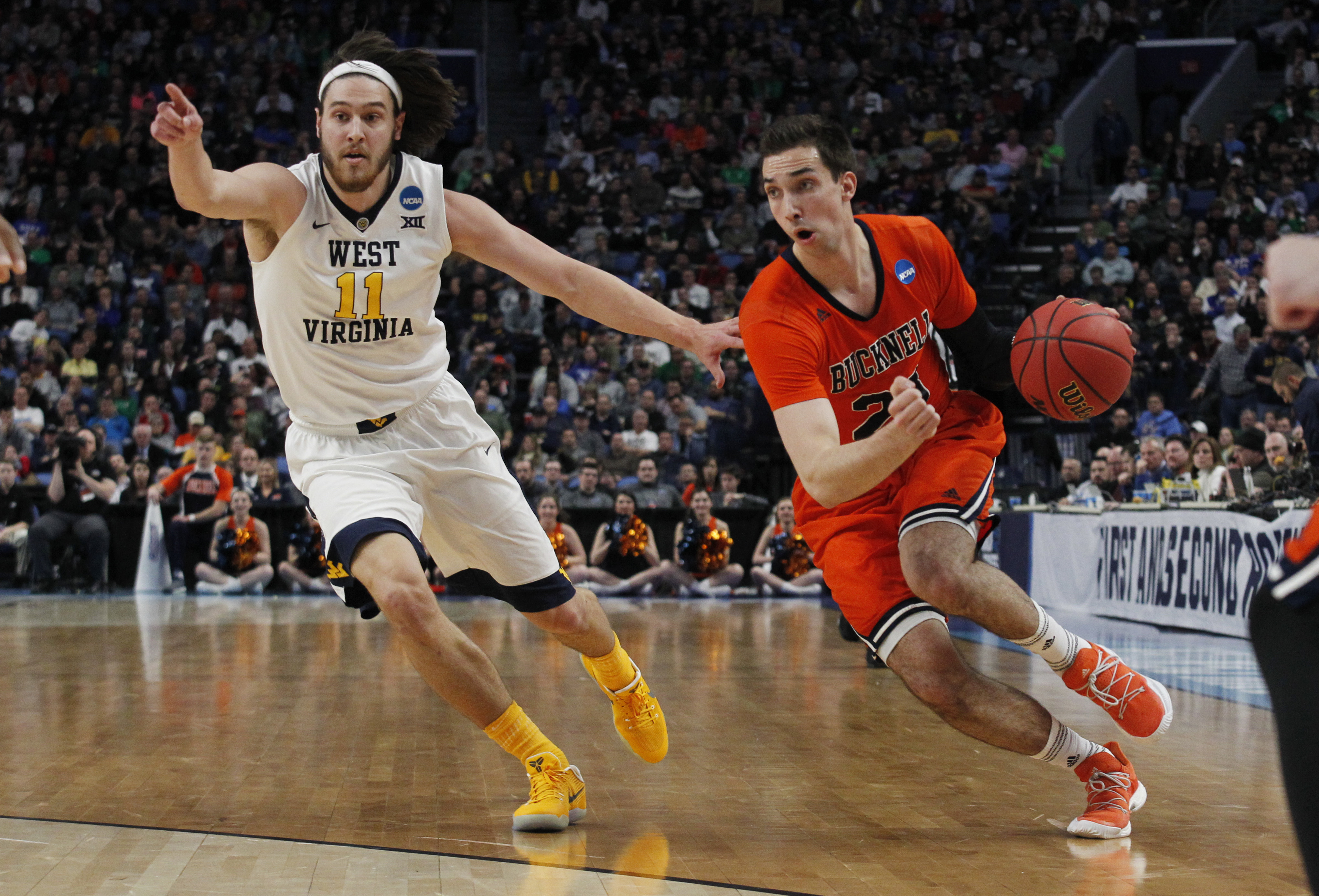 West Virginia outlasts Bucknell in 86-80 first-round win