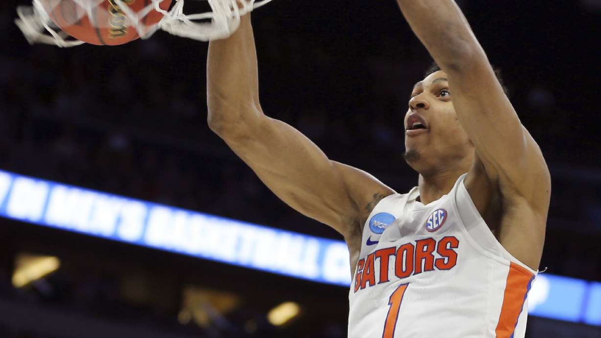 Robinson gets hot, No. 4 seed Florida beats ETSU 80-65