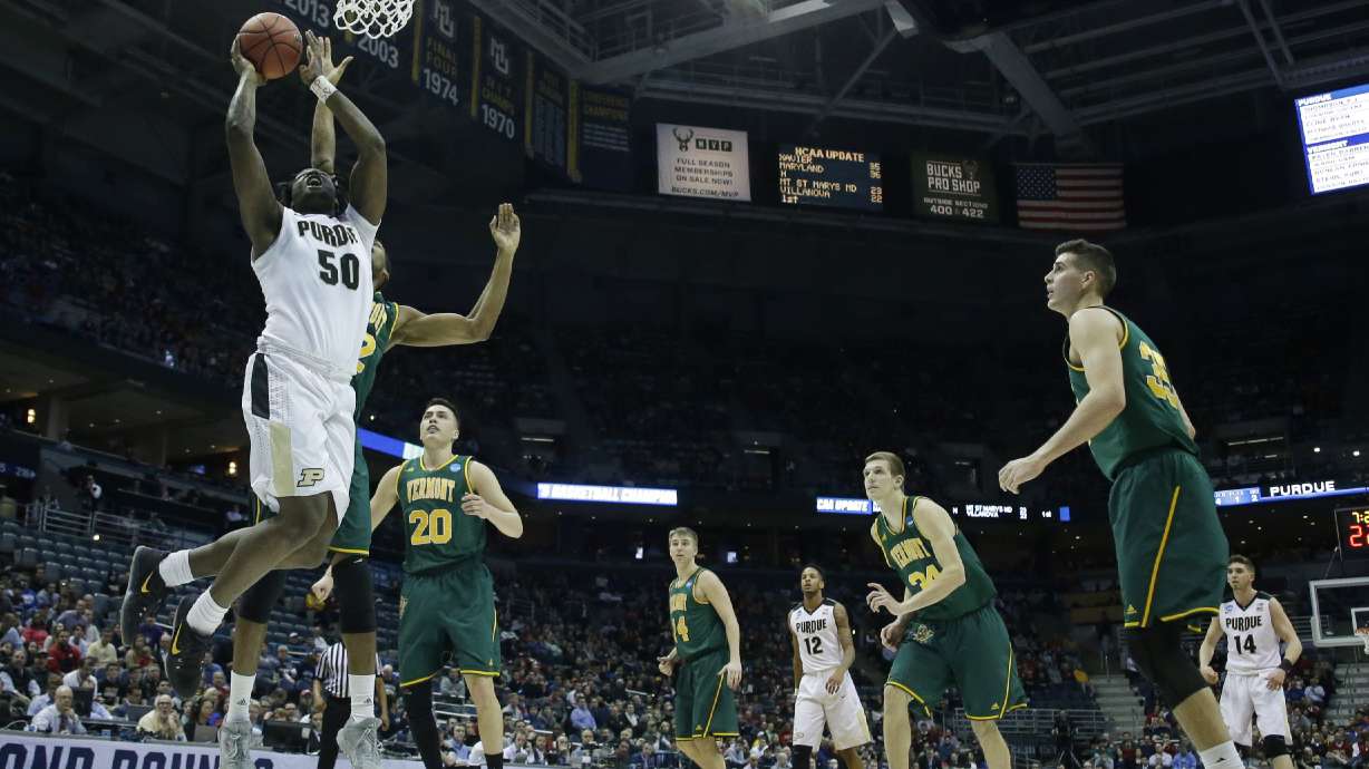 Edwards, Purdue hold off Vermont 80-70 in NCAA Tournament