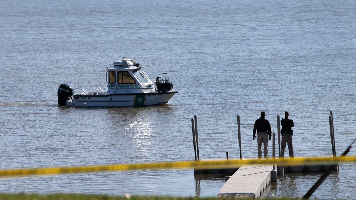 The Latest: Man found dead in burned home was shot in head