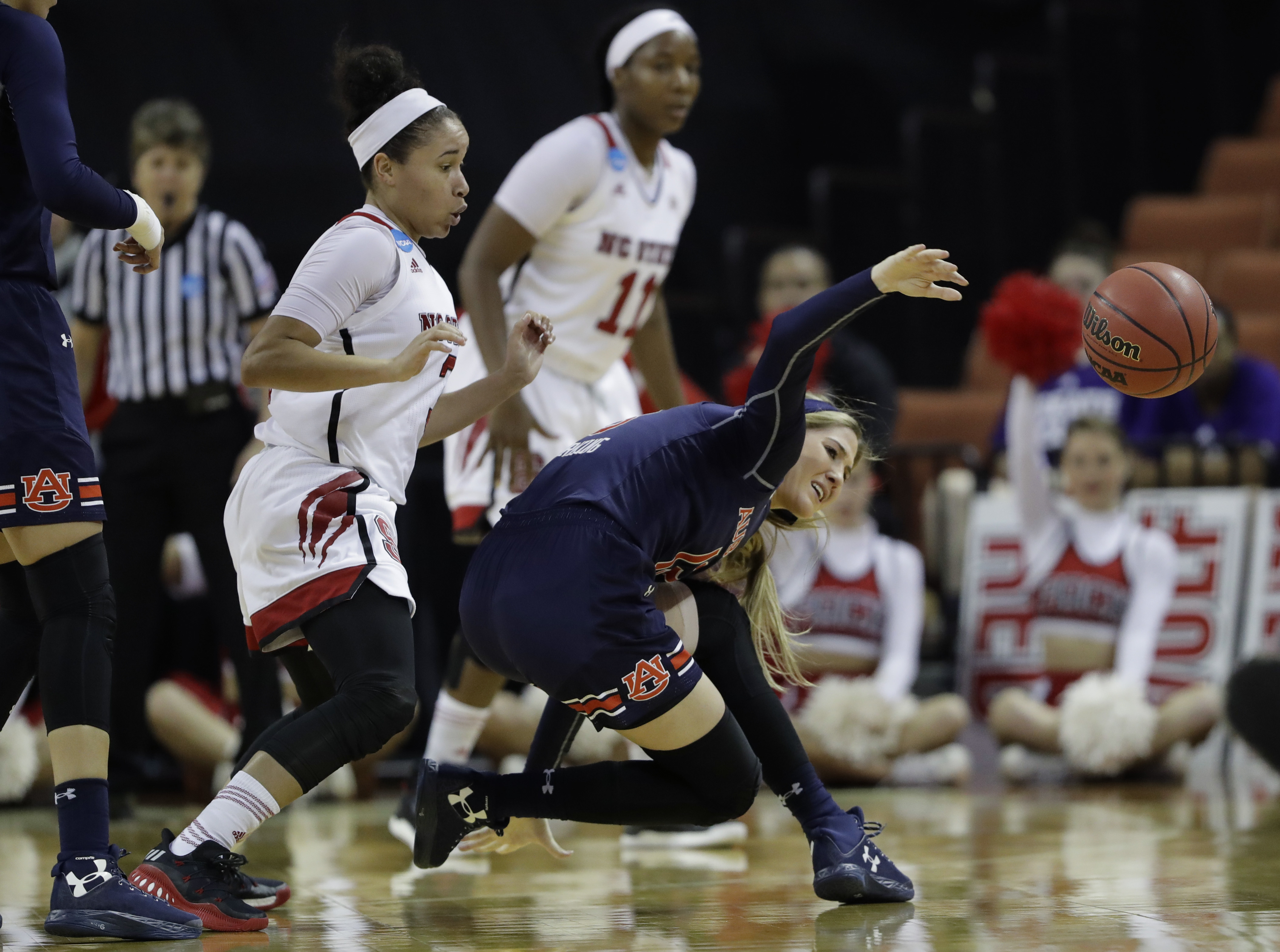 Wilson scores 23, North Carolina State rolls Auburn 62-48