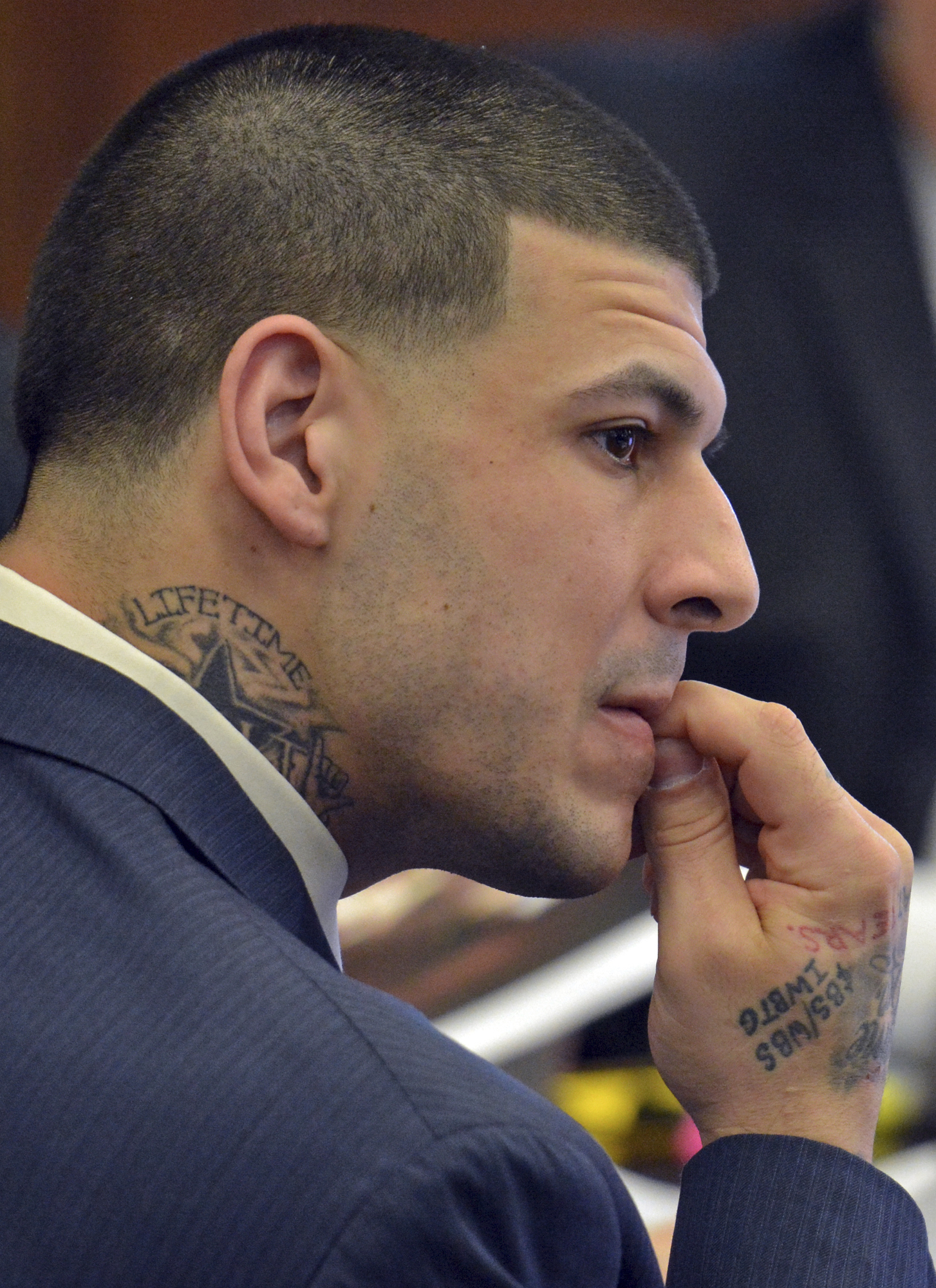 Jury hears from tattoo artist in ex-NFL star's murder trial