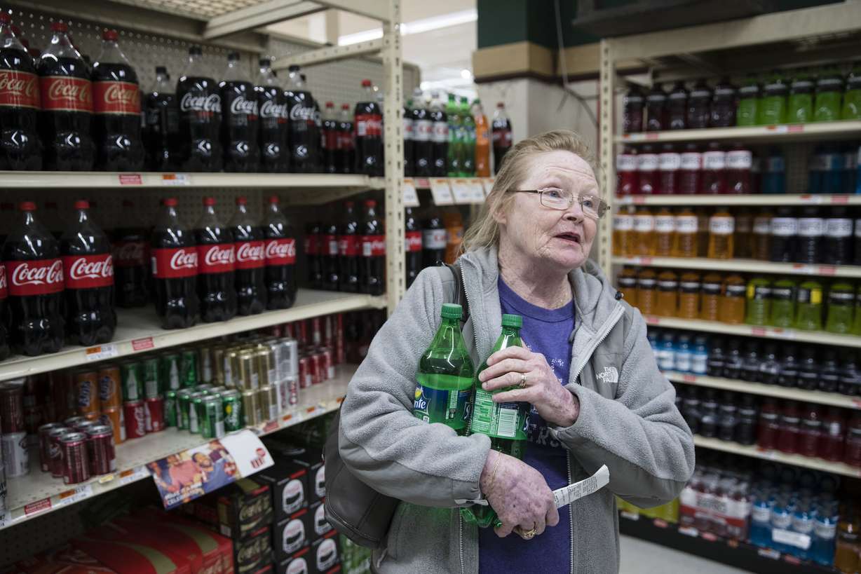 Margaret Atkinson speaks during an interview as she shops for soda at the IGA supermarket in the Port Richmond neighborhood of Philadelphia. Photo: AP Photo