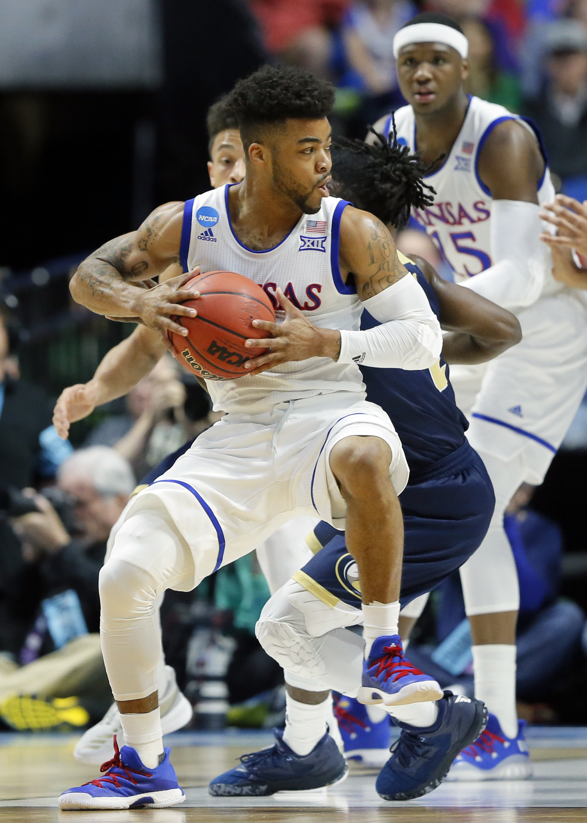 Mason, Jackson spark top-seeded Kansas past UC Davis, 100-62