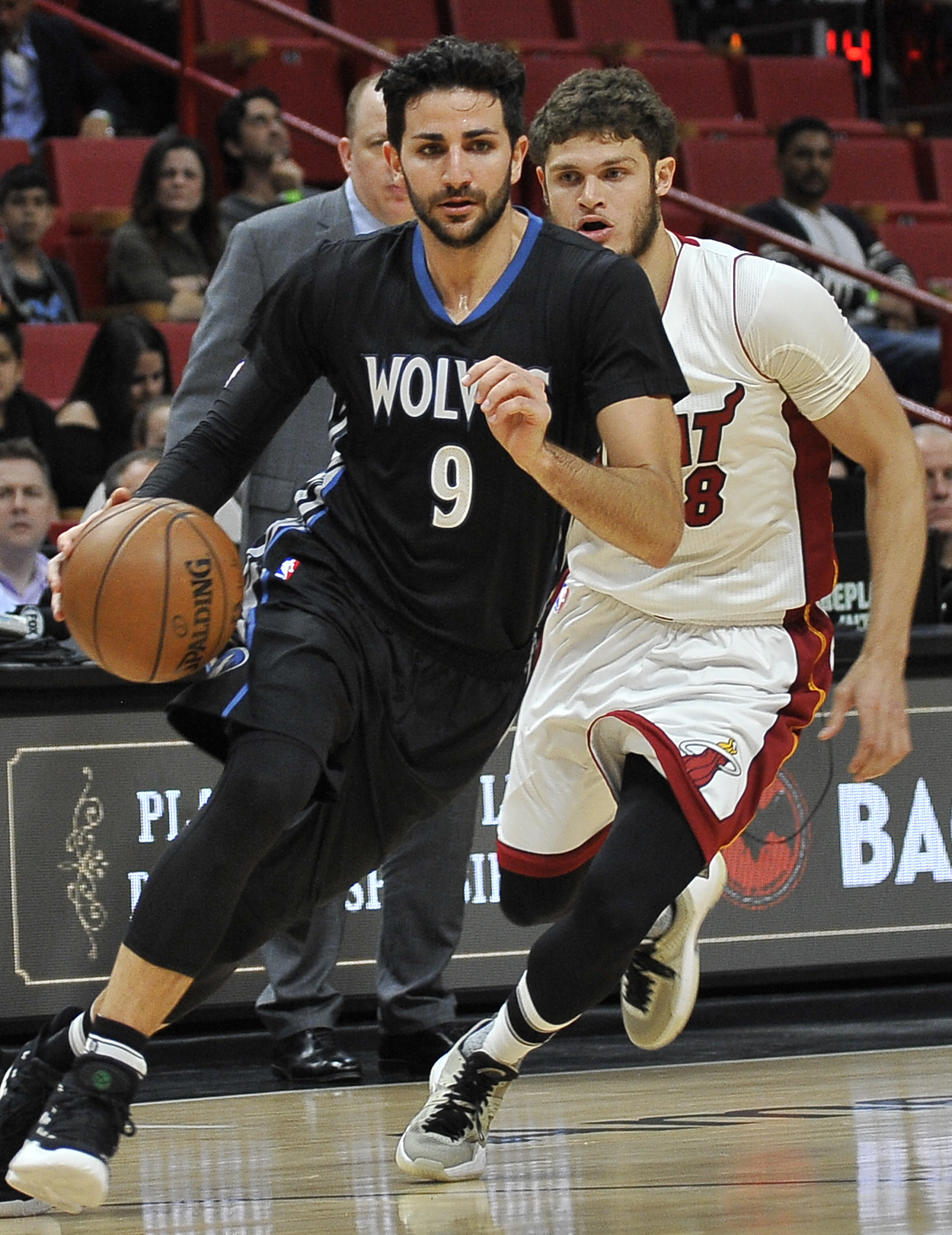 Heat pull away late, top Timberwolves 123-105