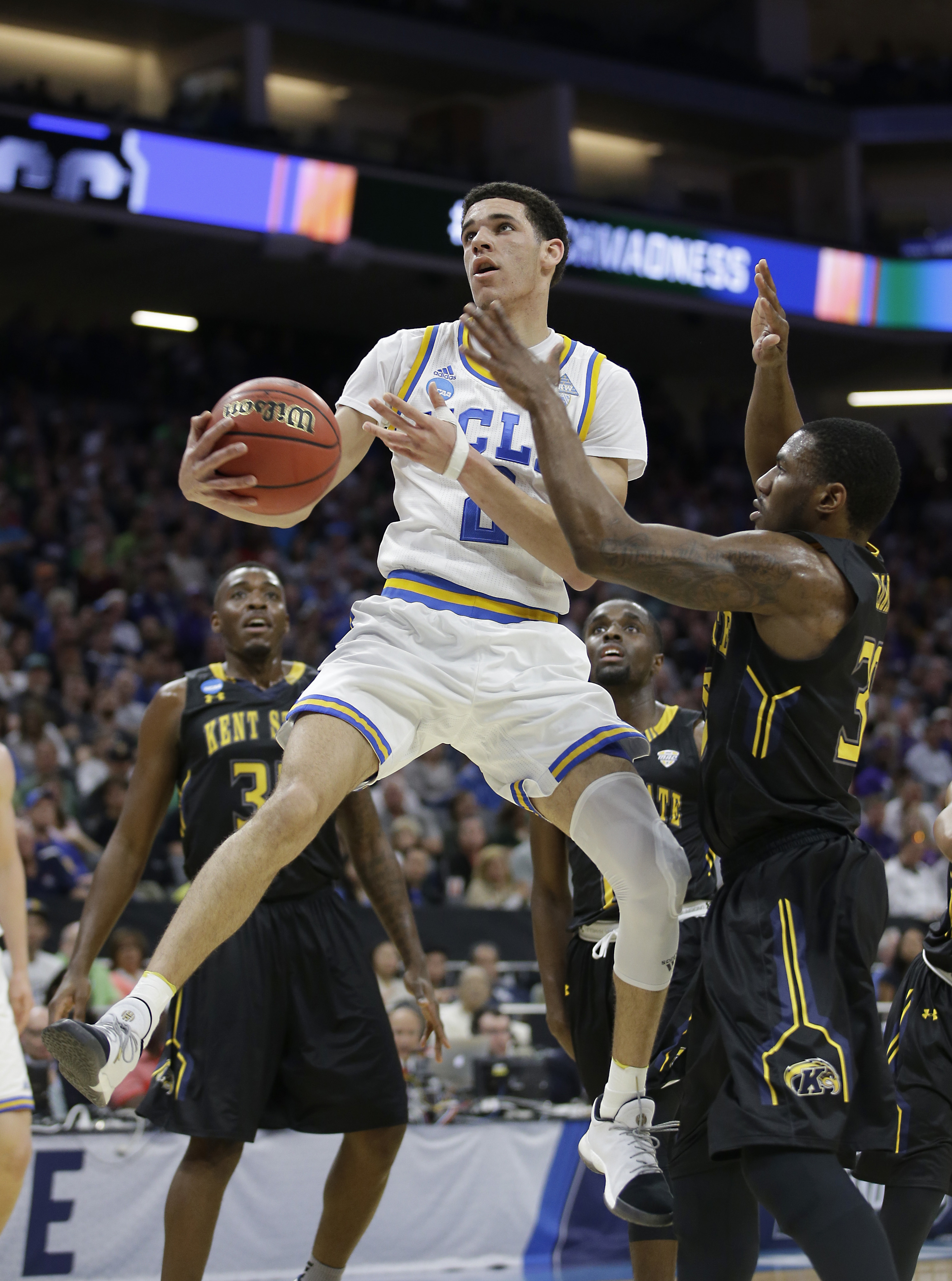 UCLA pulls away for 97-80 win over Kent State