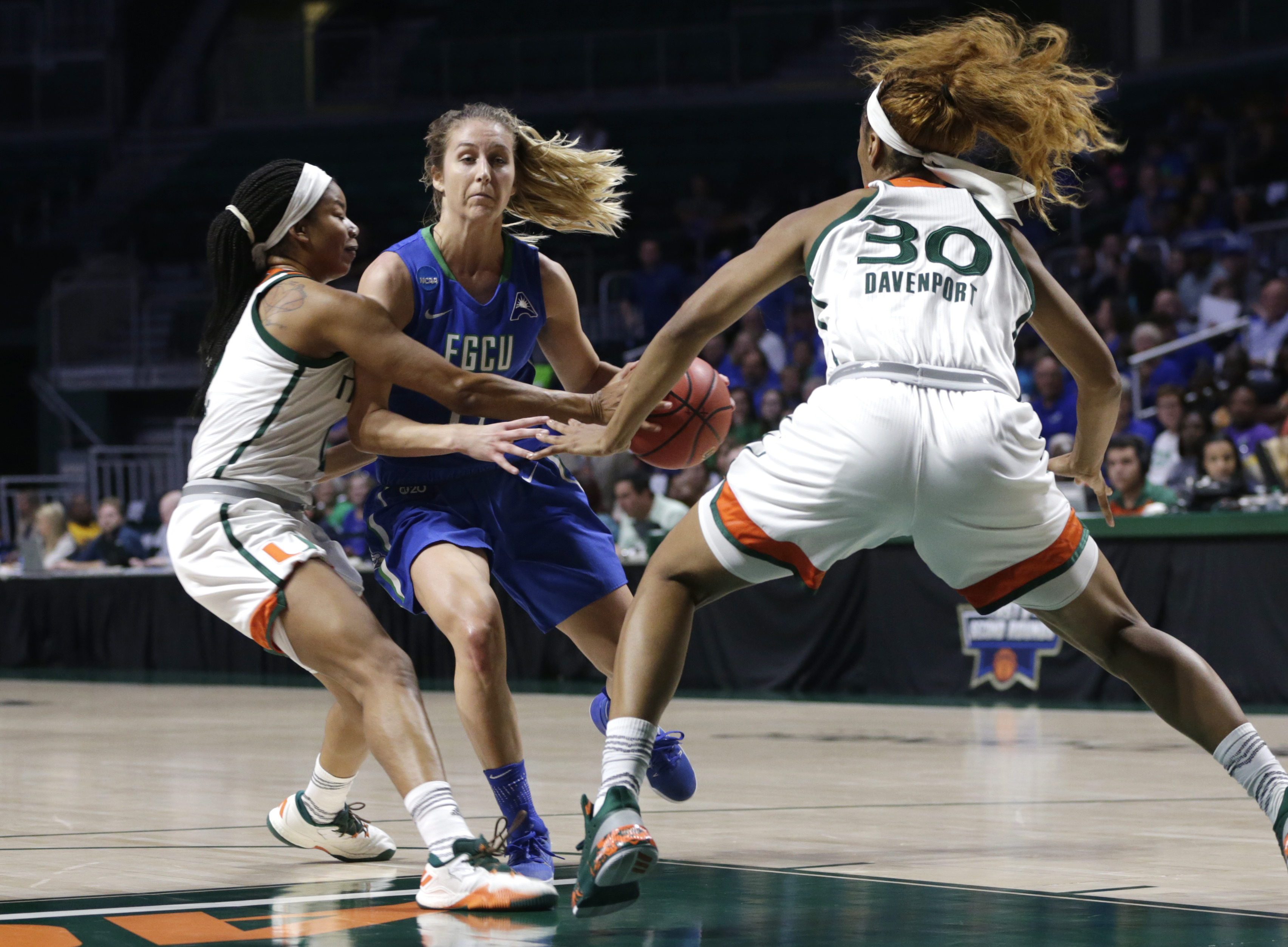 Miami holds off FGCU and moves on, 62-60