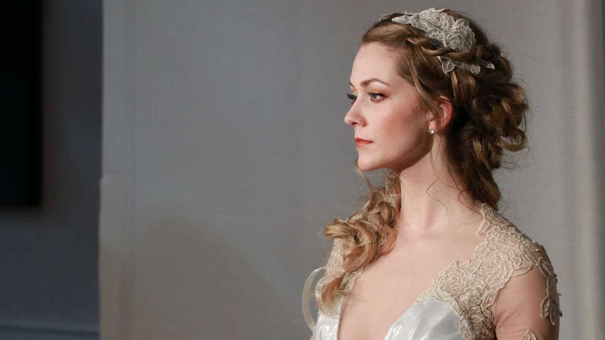 Models show off evening wear, avant-garde clothing at Utah Fashion Week