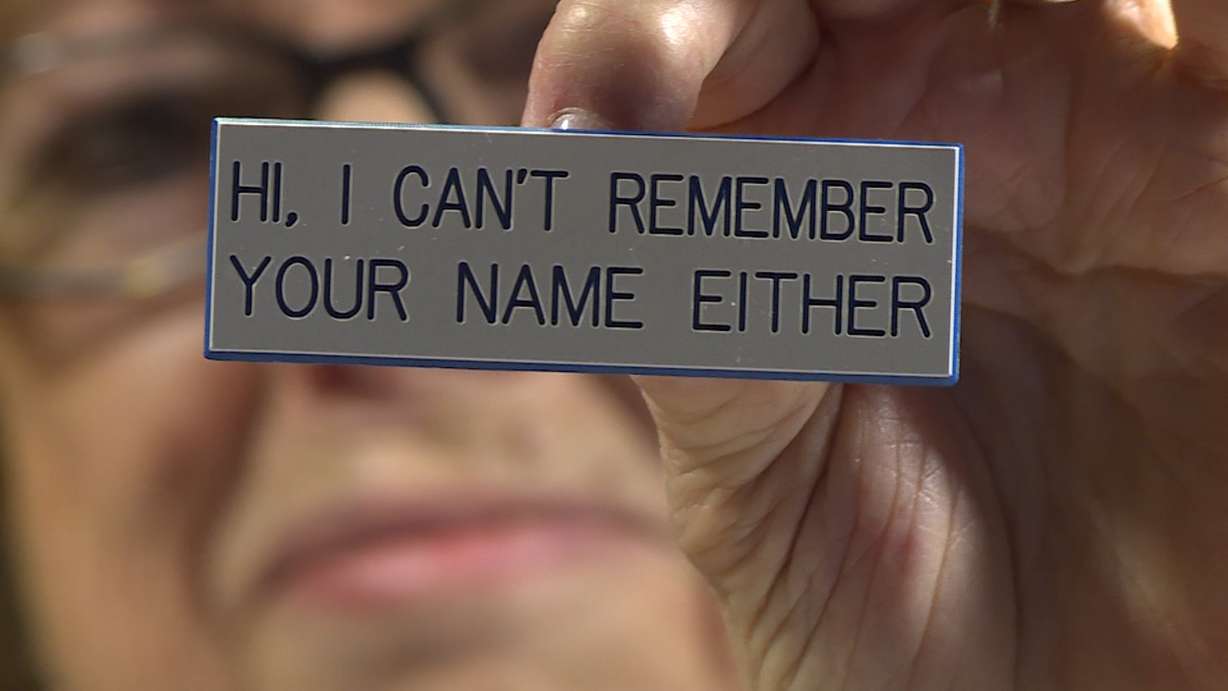 Donna Nelson says they see a lot of familiar faces in their travels, but names can be difficult — hence the name tag. (Photo: Ray Boone, KSL TV)