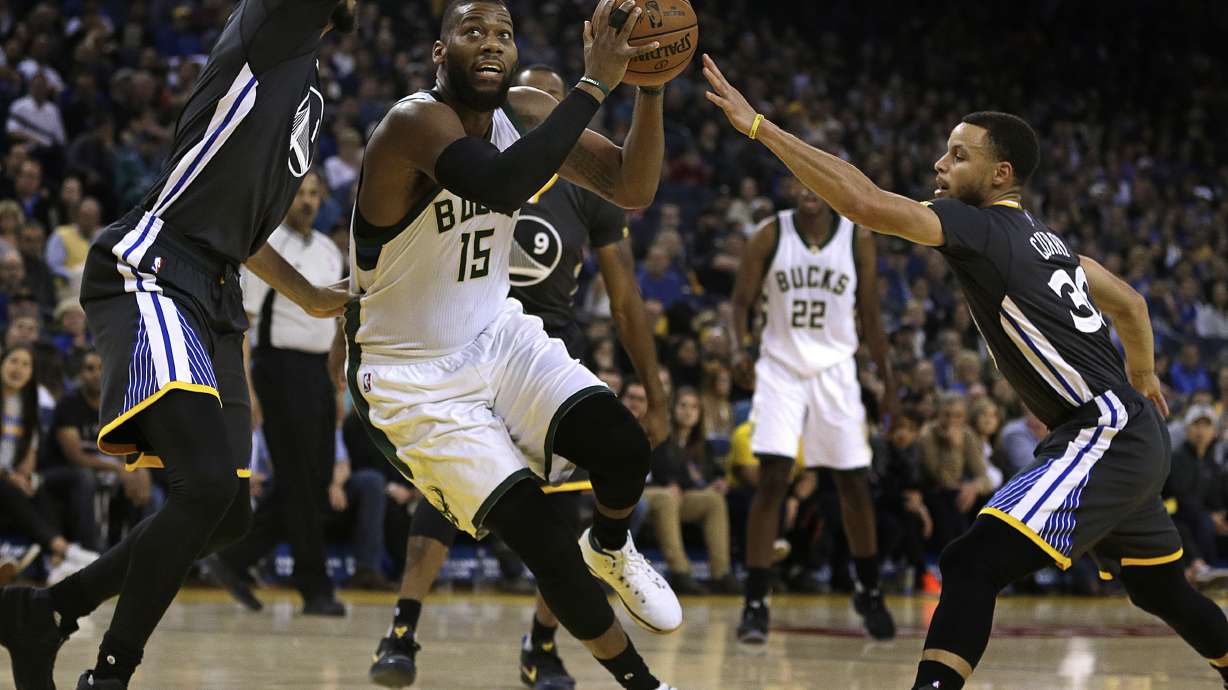 Curry scores 28, Warriors beat Bucks 117-92