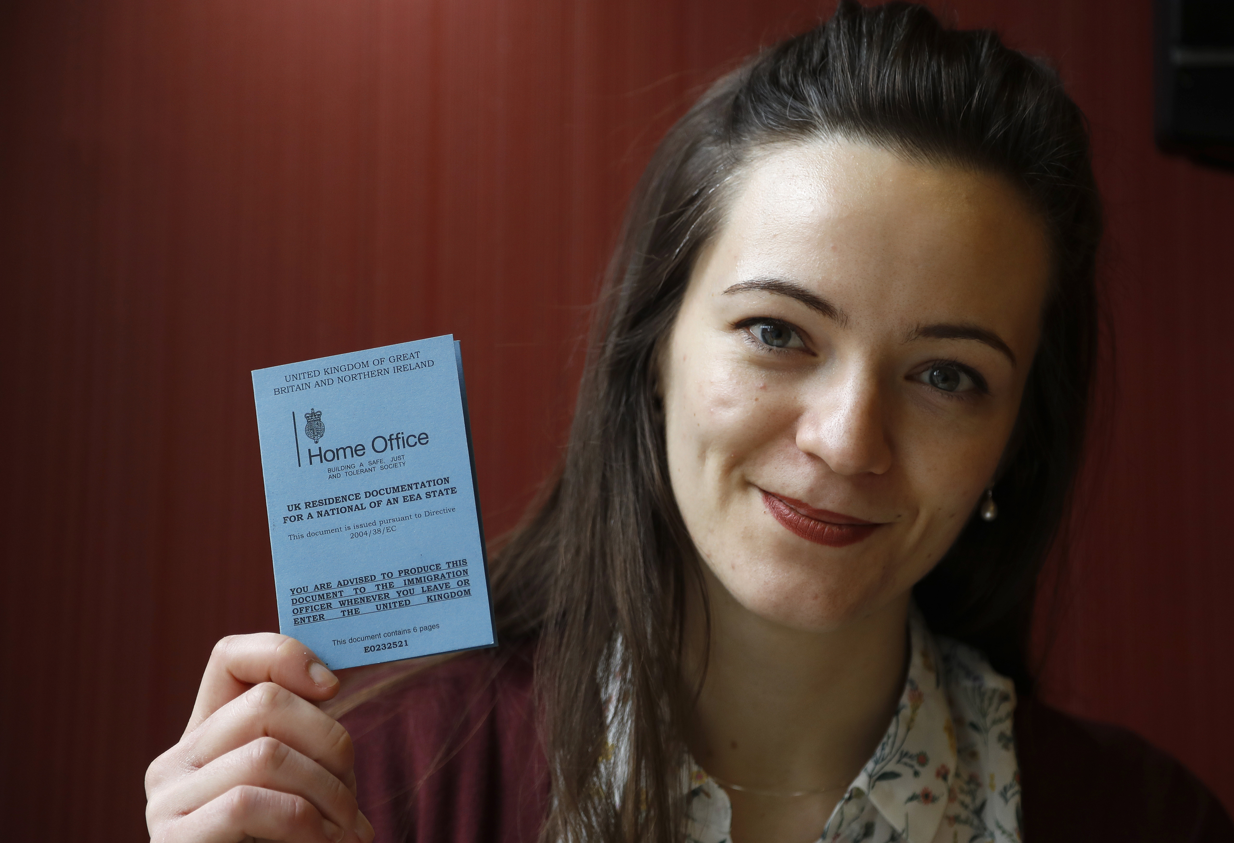 EU citizens in UK anxiously seek security before Brexit