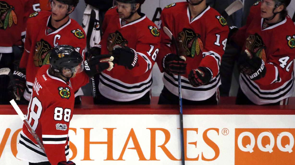 Blackhawks strike fast in third, rally past Avs 6-3