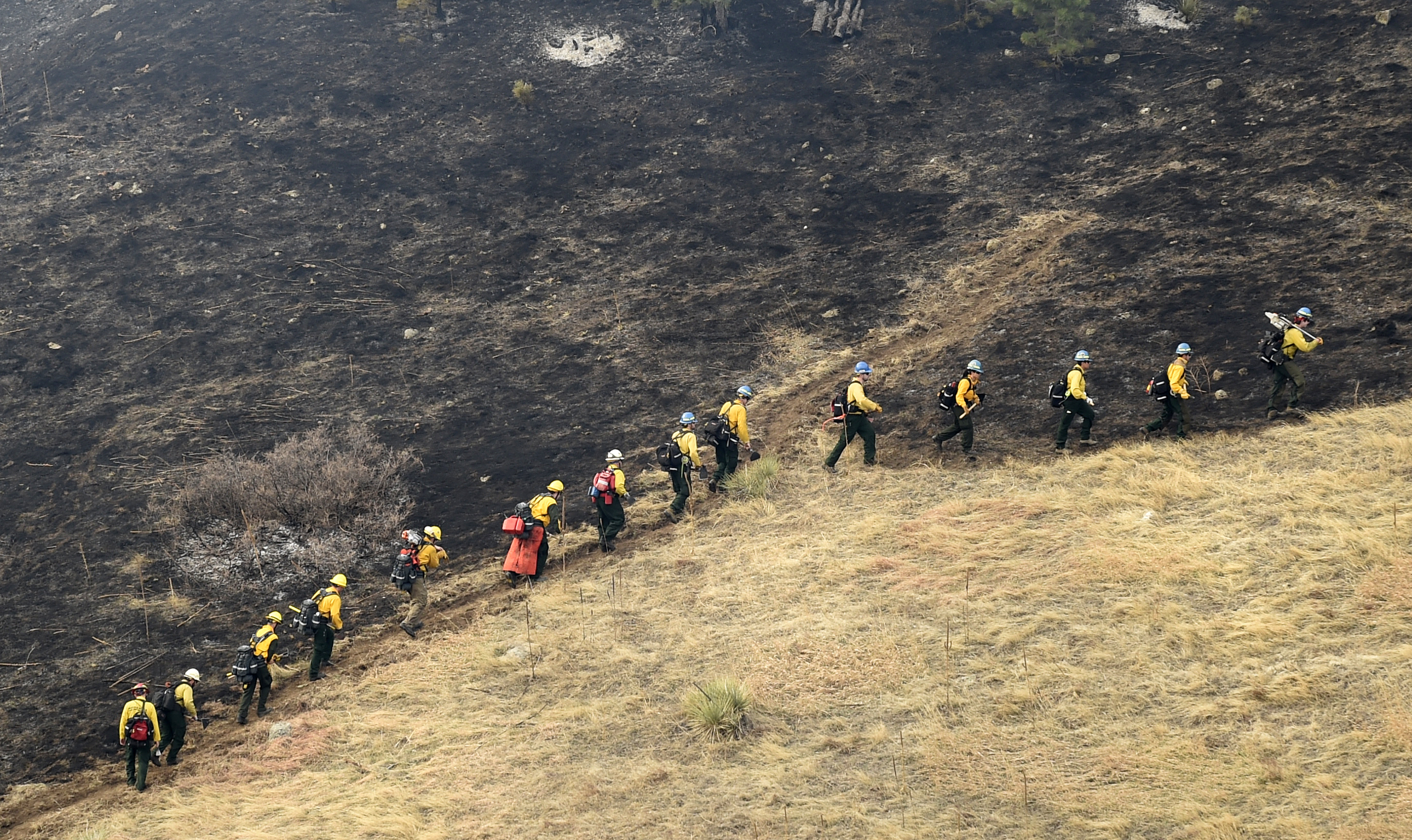 The Latest: Colorado wildfire fully contained