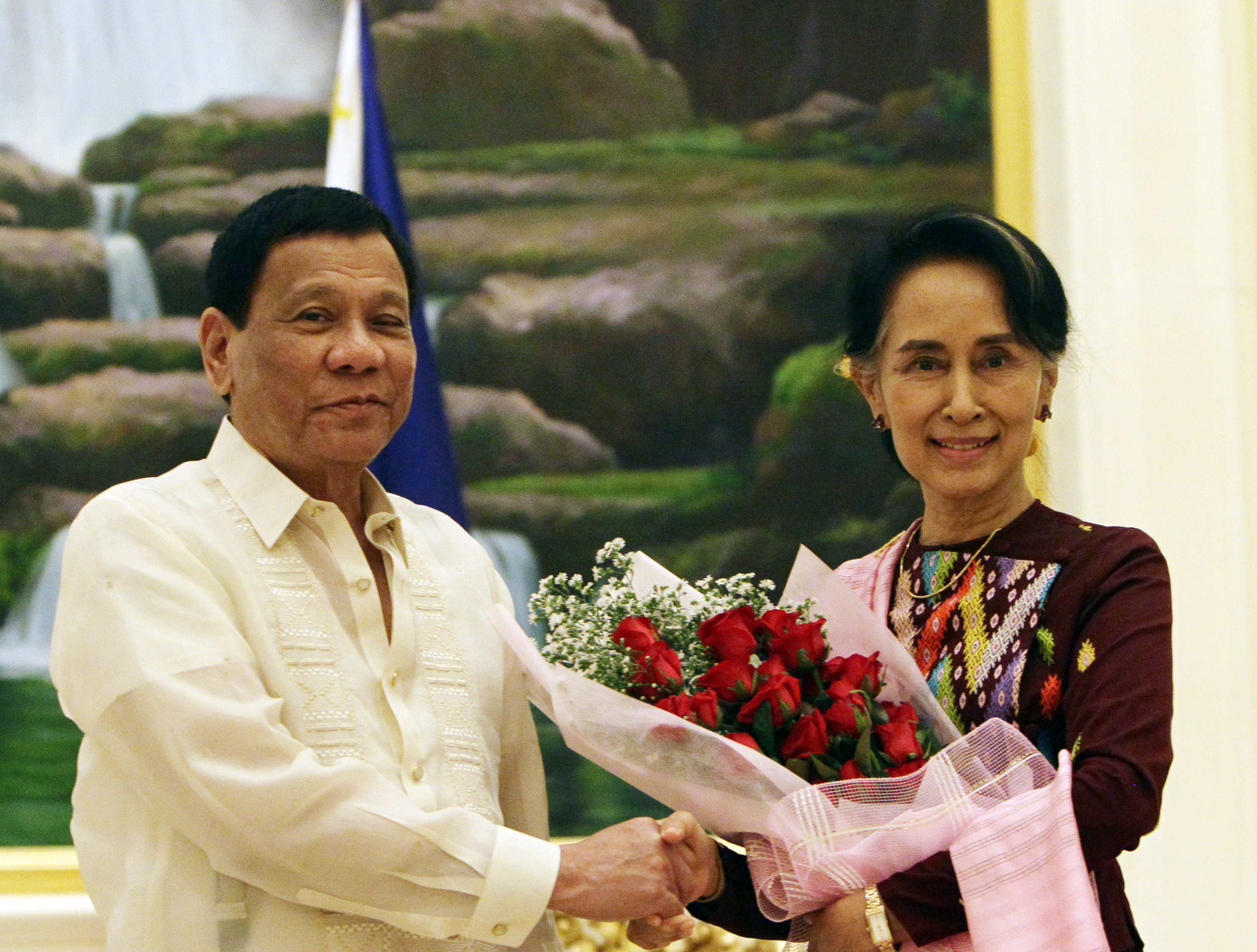 Contrast in style as Duterte meets Myanmar's Suu Kyi