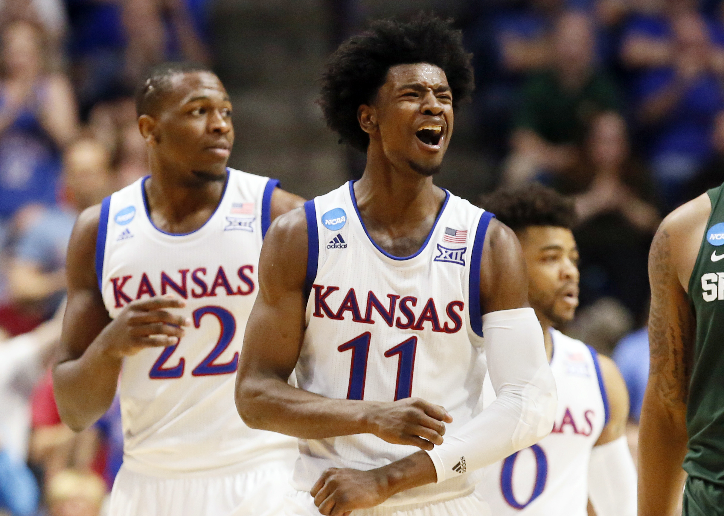 Jayhawks fans divided over on-court success, off-court woes