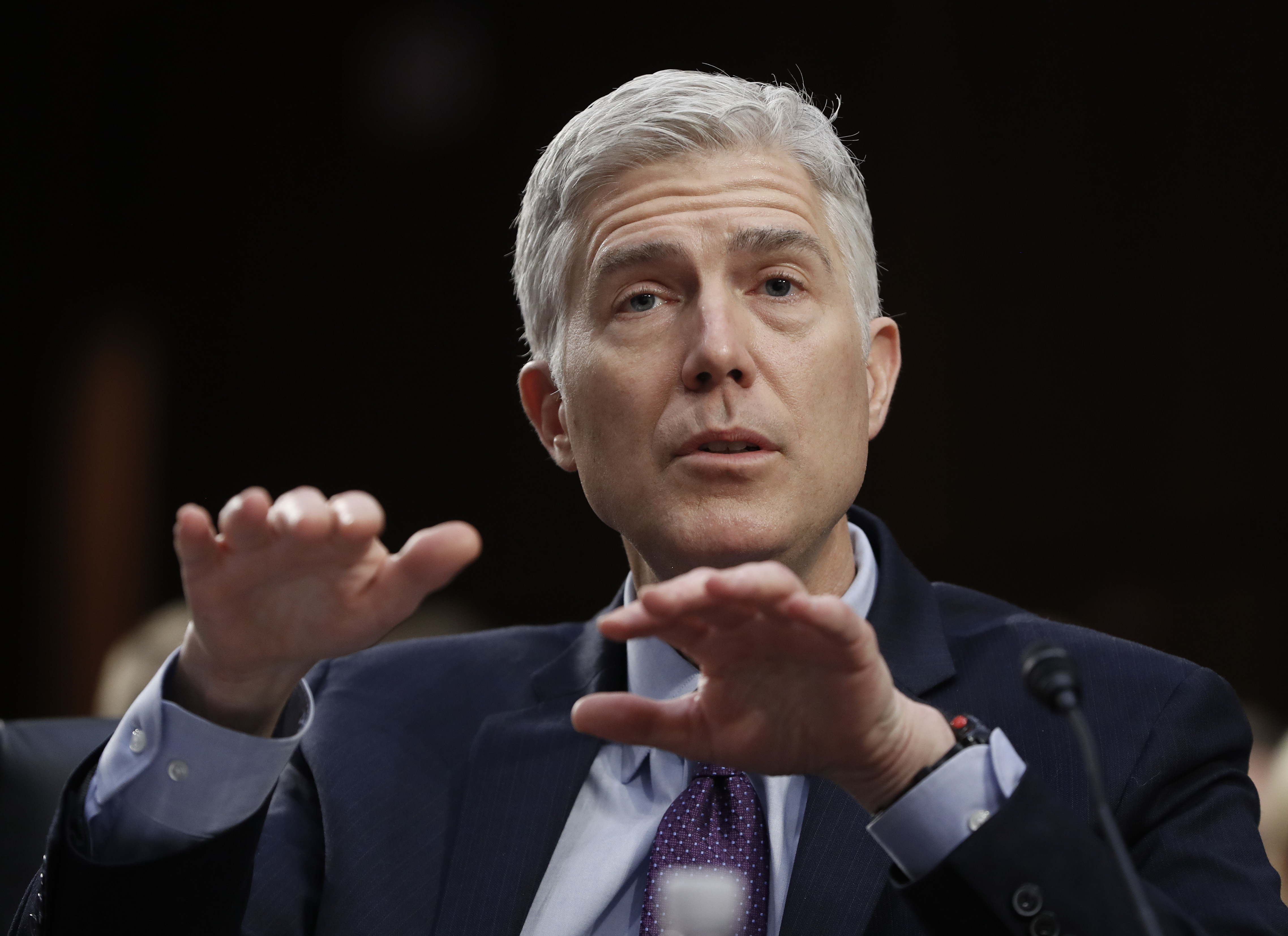 The Latest: Gorsuch flatters senators as questioning wraps