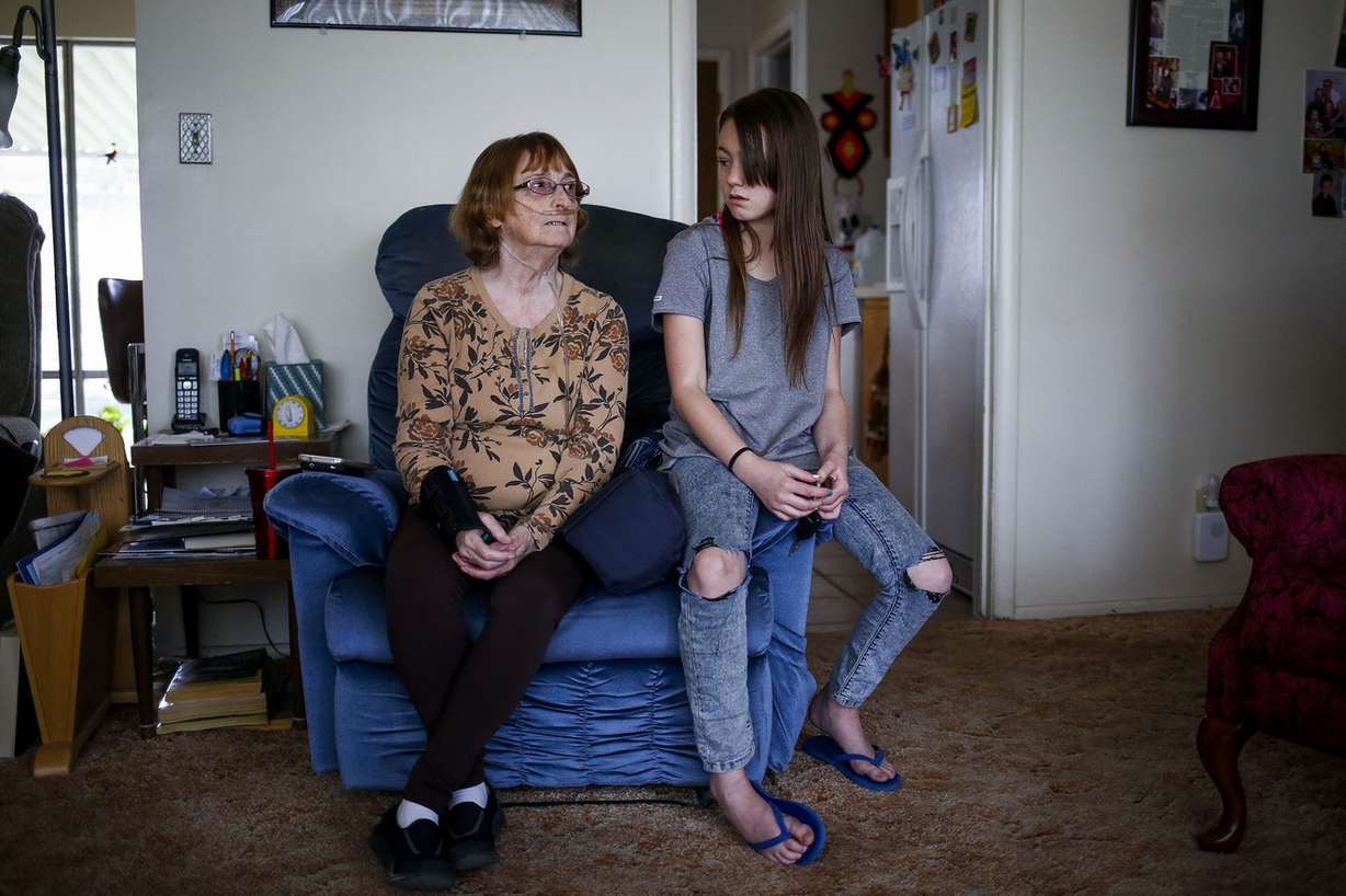 Becky Caudle, Adele Adams' second-youngest daughter, and Adams' great-granddaughter, Violet, 9, visit Adams in North Ogden on Wednesday, March 22, 2017. Photo: Nicole Boliaux, Deseret News