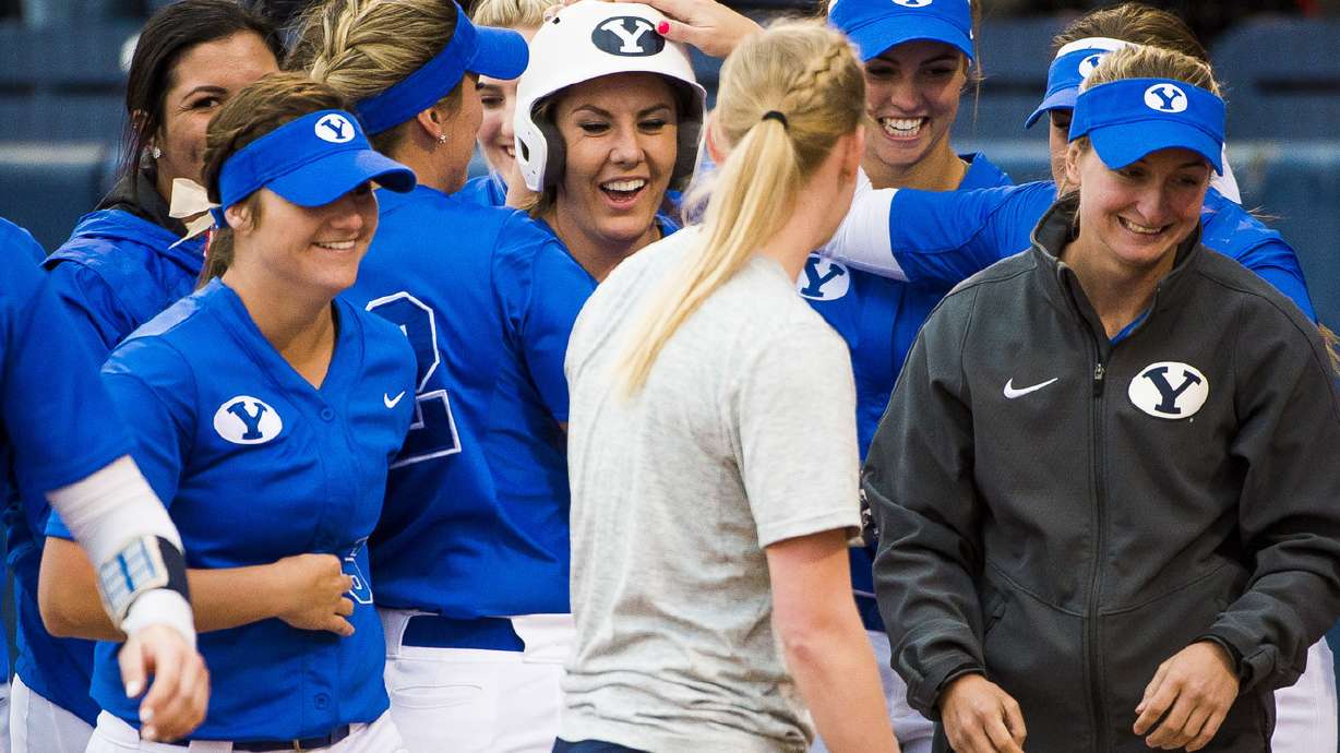 Sugg's 2 homers help BYU softball upset No. 11 Utah in lone game of season