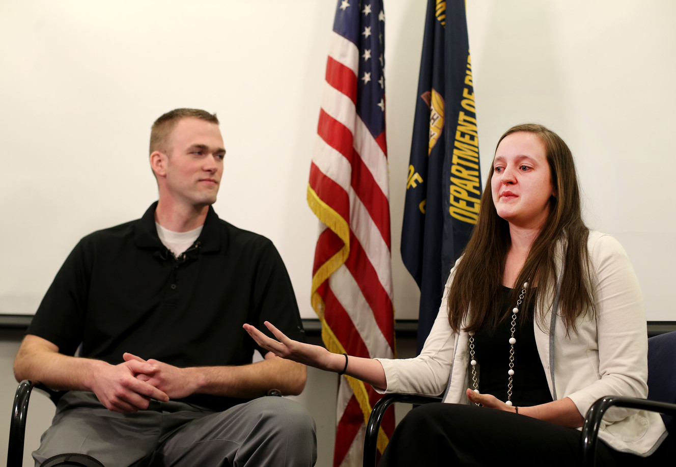 Utah Highway Patrol trooper Devyn Gurney, who was injured after being stuck by a vehicle while conducting a traffic stop on I-15 in Utah County earlier this month, and his wife, Summer, discuss the incident during a press conference at the Highway Patrol office in Murray on Thursday, March 23, 2017. (Photo: Laura Seitz, Deseret N