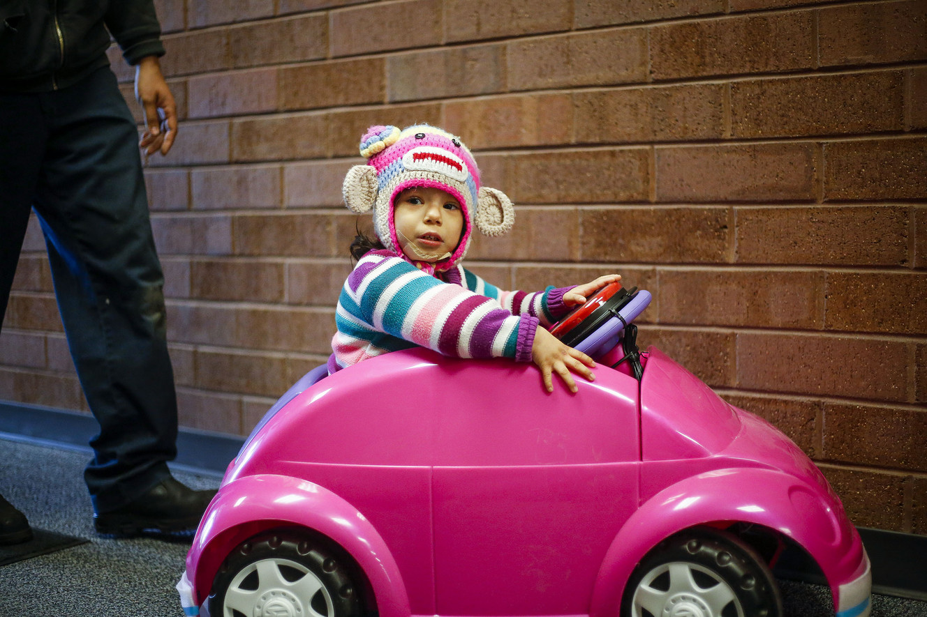 Valeria Naranjo, 4, tests out her new adapted electric car at the Utah Center for Assistive Technology in Salt Lake City on Thursday, March 23, 2017. Photo: Nicole Boliaux, Deseret News