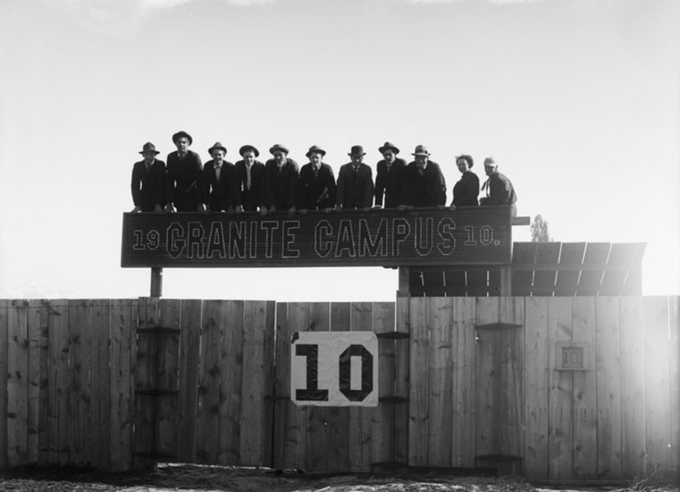 A group senior boys from Granite High School posing for a photograph on top of a fence on April 22, 1910. (Photo: Utah State Division of History)