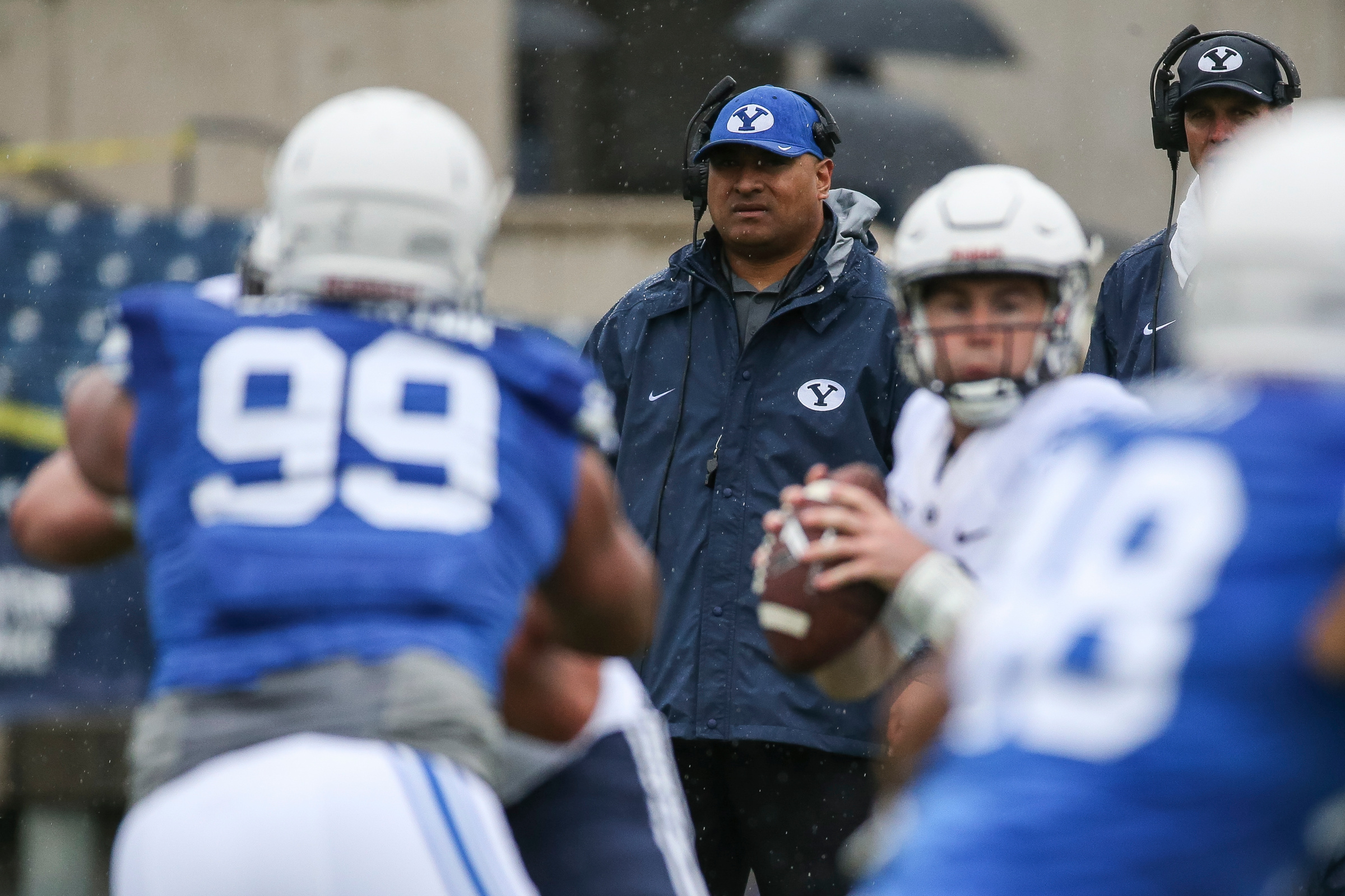 Head coach Kalani Sitake watches the action during the BYU football spring practice and scrimmage at LaVell Edwards Stadium in Provo on Saturday, March 25, 2017. (Photo: Spenser Heaps, Deseret News)