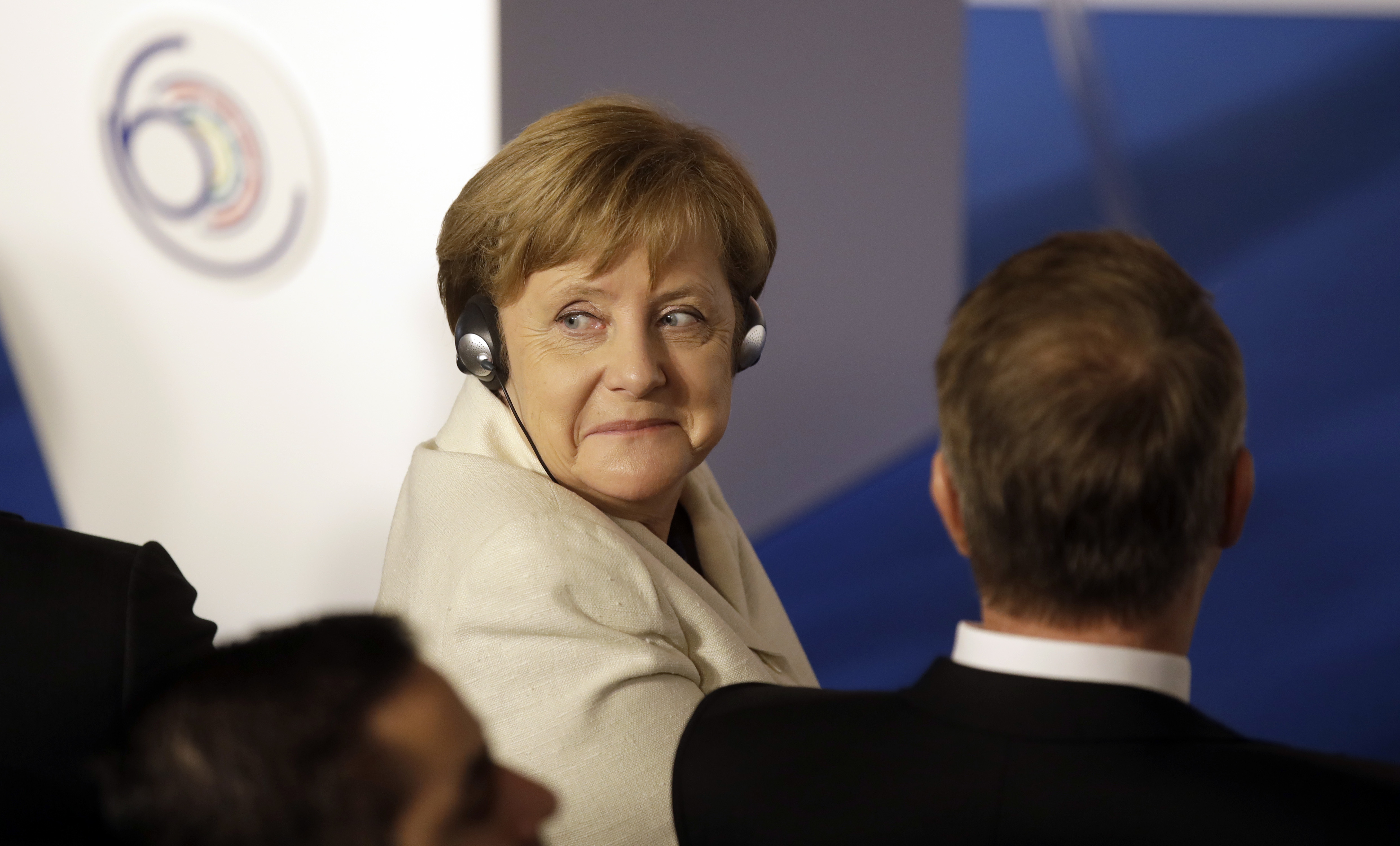 Merkel celebrates German election win, challenger deflated