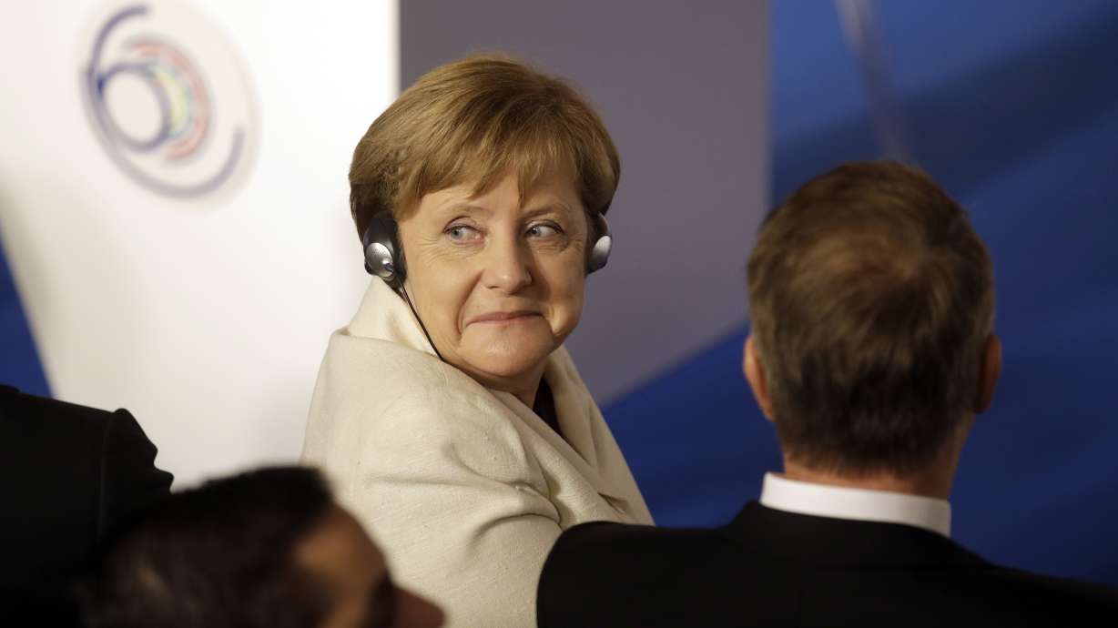 Merkel celebrates German election win, challenger deflated