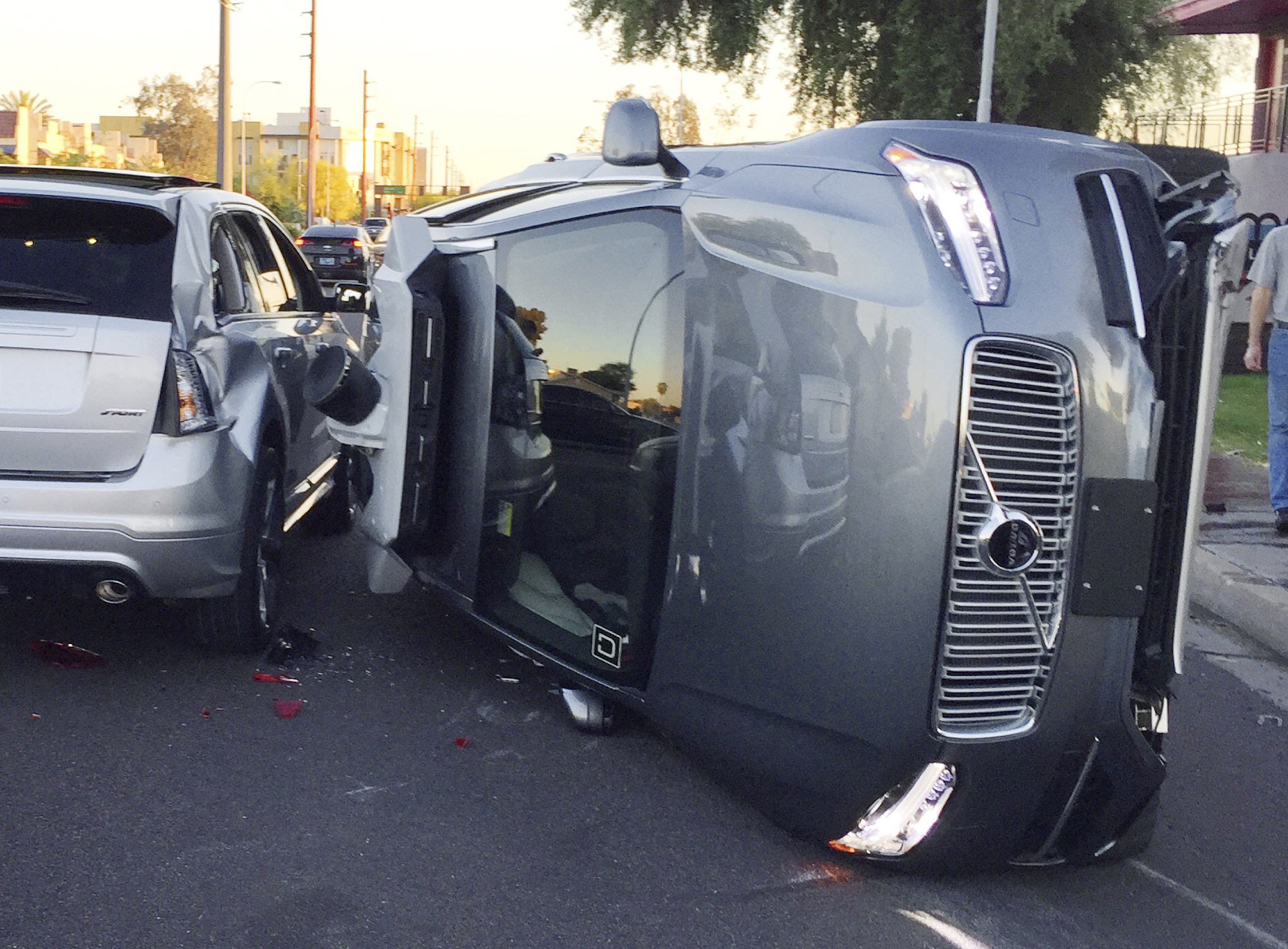 This March 24, 2017, photo provided by the Tempe Police Department shows an Uber self-driving SUV that flipped on its side in a collision in Tempe, Ariz. Photo: AP Photo