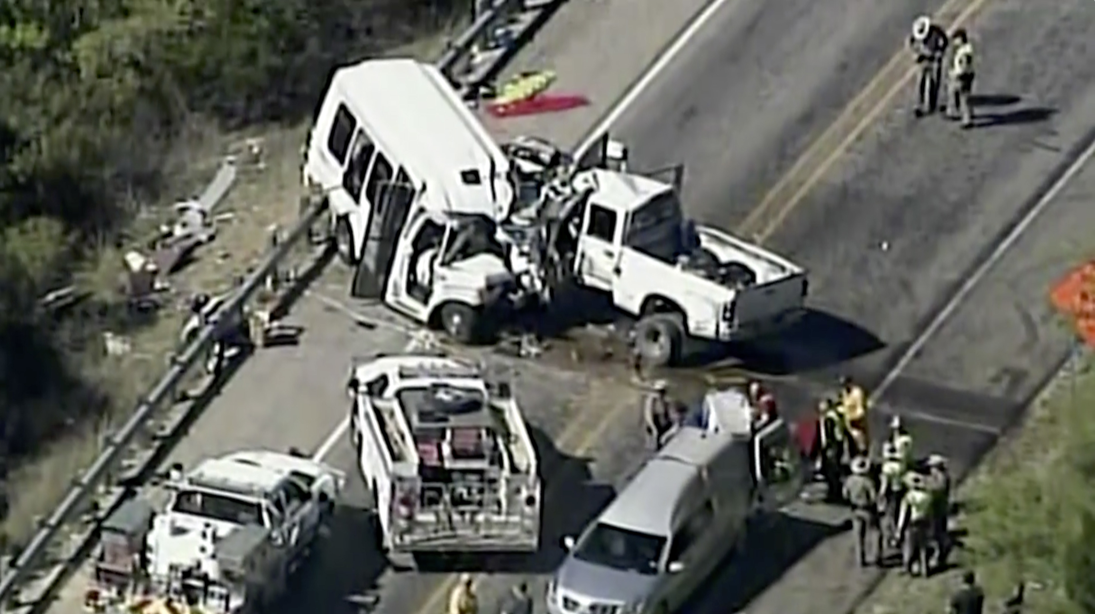 Officials: Callers saw a pickup swerving before Texas crash