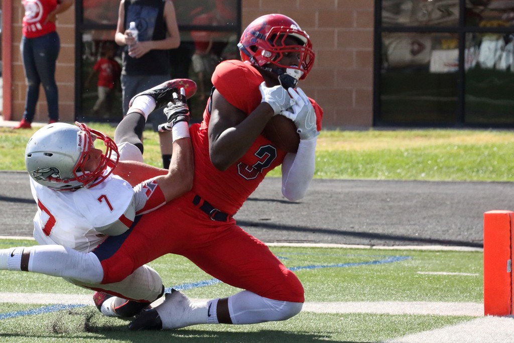 Charges: Dixie State football player sent messages threatening himself