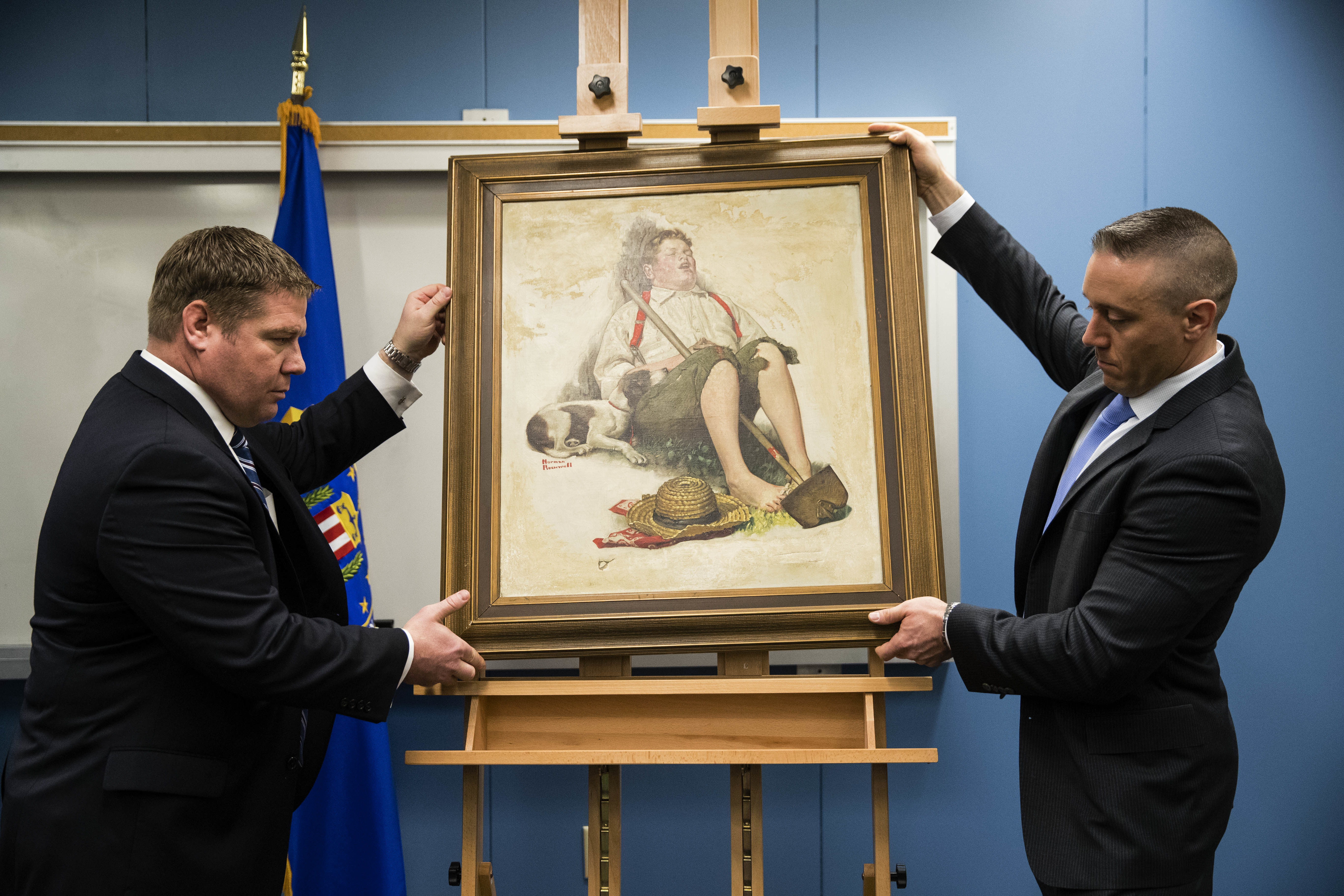 Family recognized stolen Rockwell painting by pool-cue hole