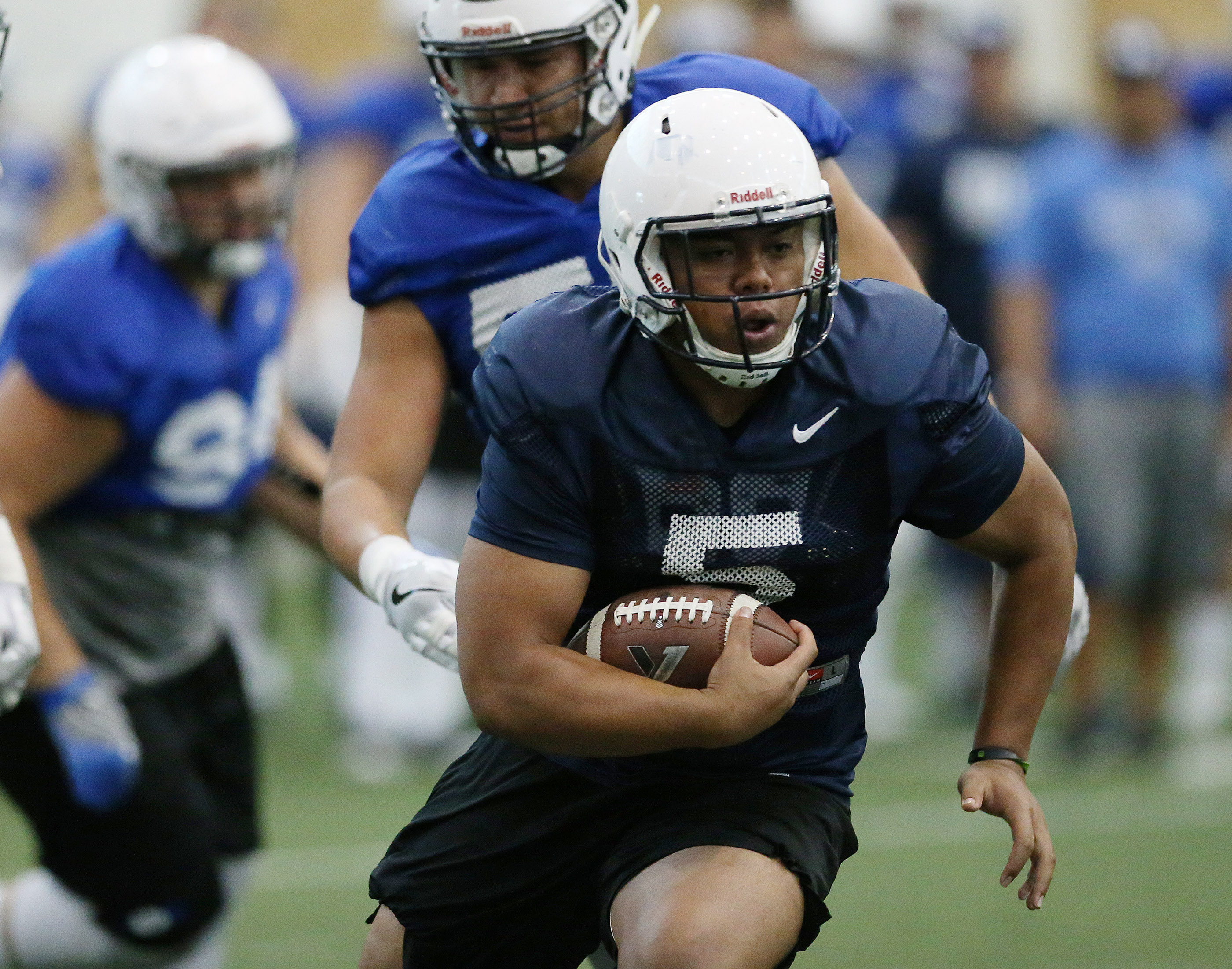 BYU running back Ula Tolutau (5) runs during BYU football alumni day practice in Provo on Friday, March 31, 2017. (Photo: Jeffrey D. Allred, Deseret News)