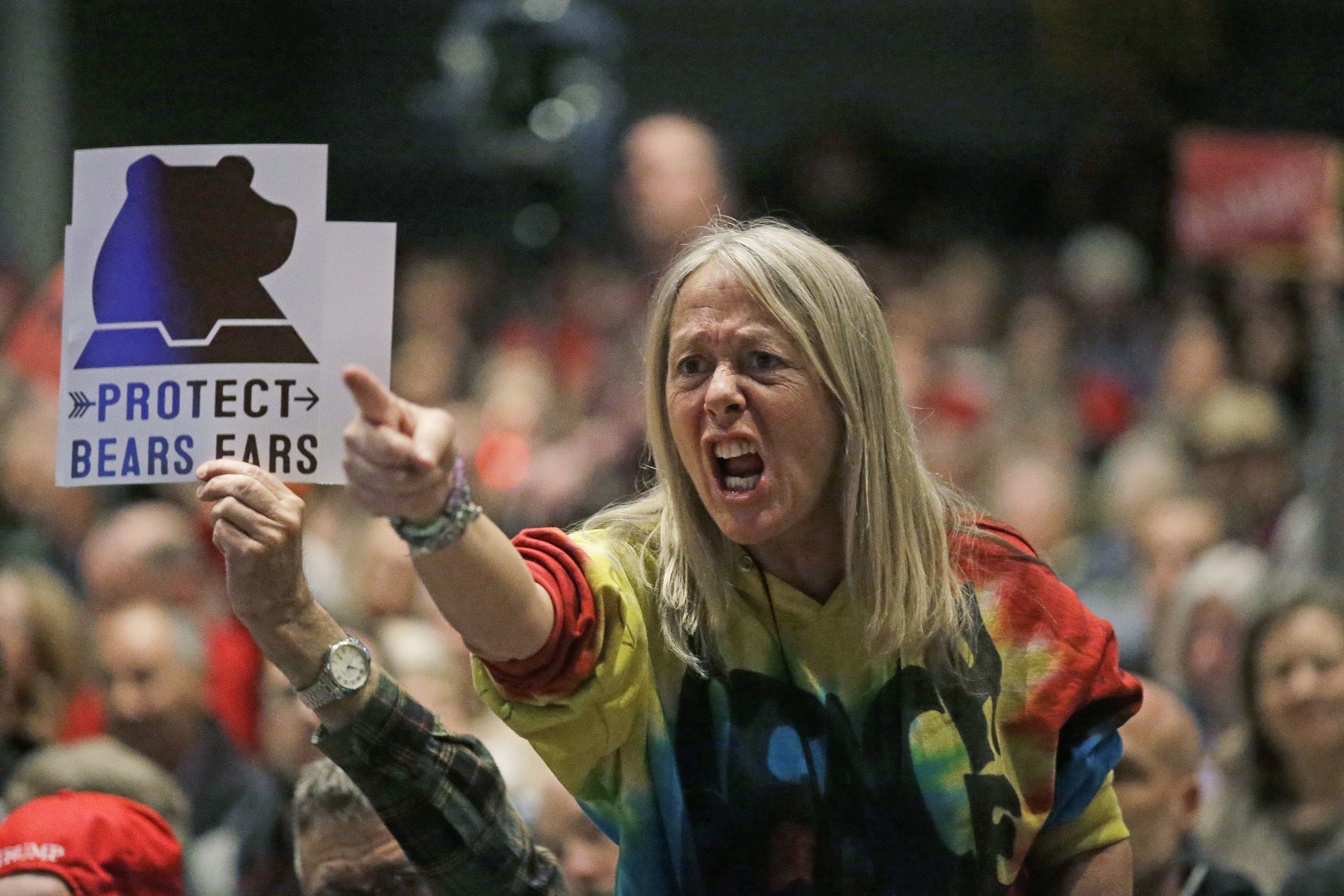 A woman shouts during Republican U.S. Rep. Chris Stewart town hall meeting Friday, March 31, 2017, in Salt Lake City. Stewart says he knows that many of those attending his town hall in heavily Democratic Salt Lake City probably didn't vote for him, but the Republican congressman says he feels it's important to appear before his constituents. (AP Photo/Rick Bowmer)