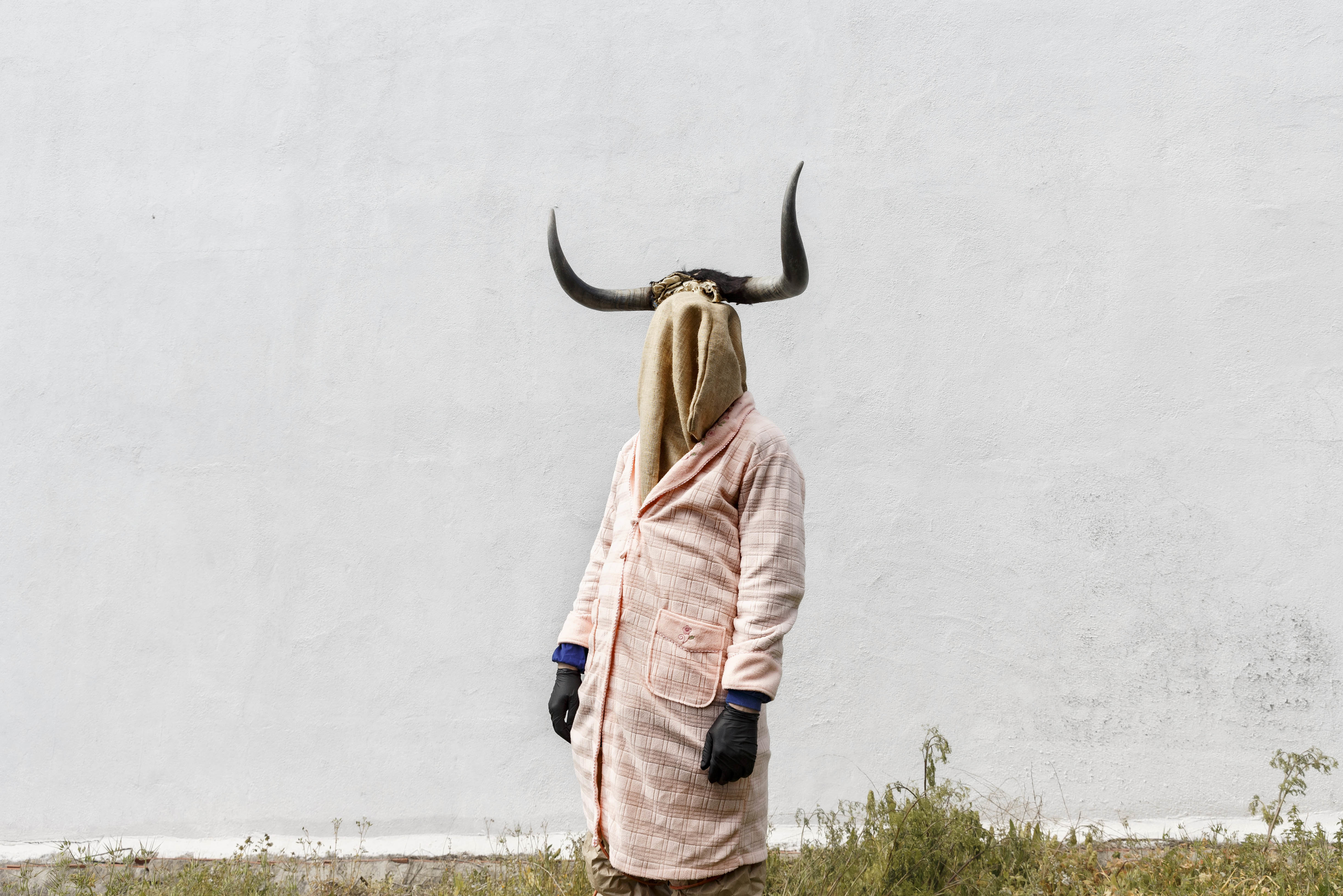 AP PHOTOS: Spanish parades feature bizarre costumes, masks