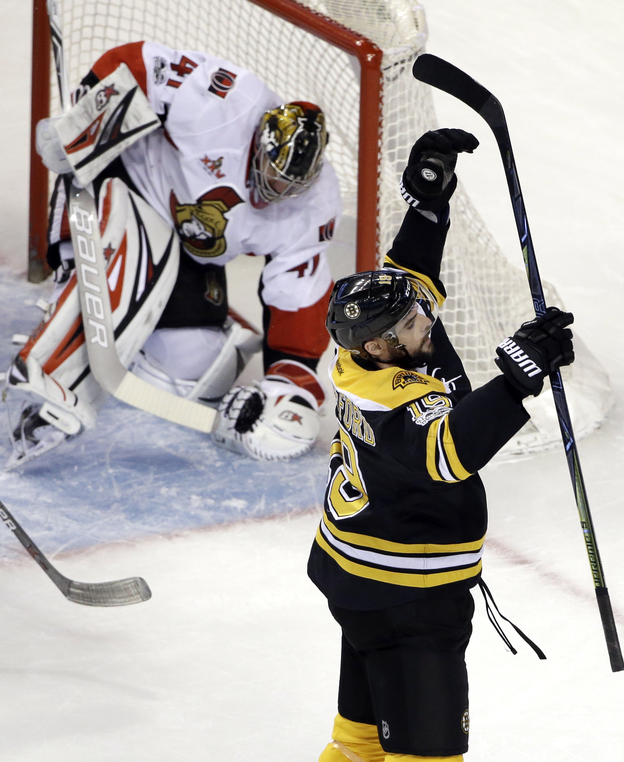 Senators beat Bruins 2-1 in shootout to pull ahead in chase